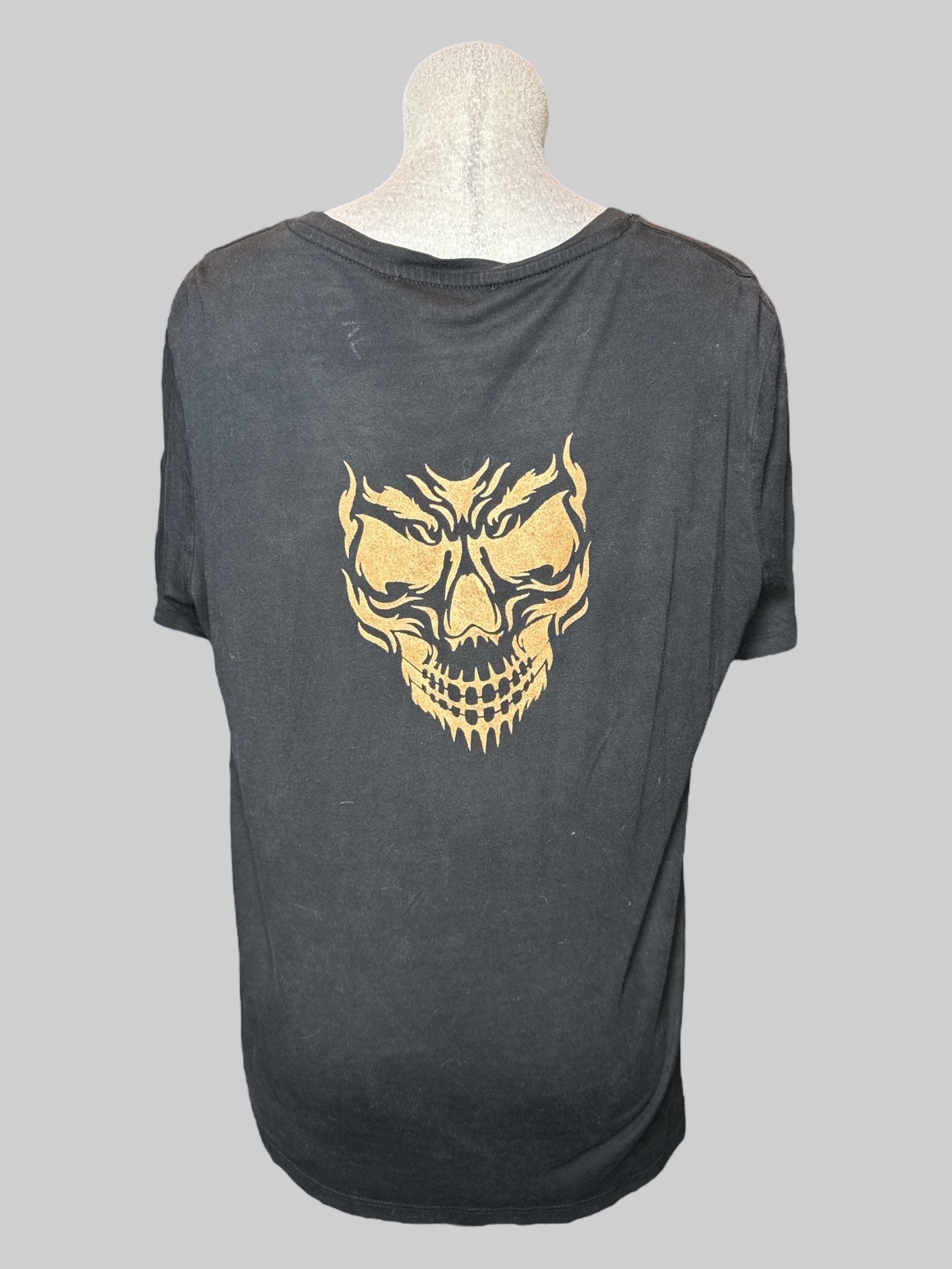XL black tee with bronze jack-o’-lantern smile graphics on front and back