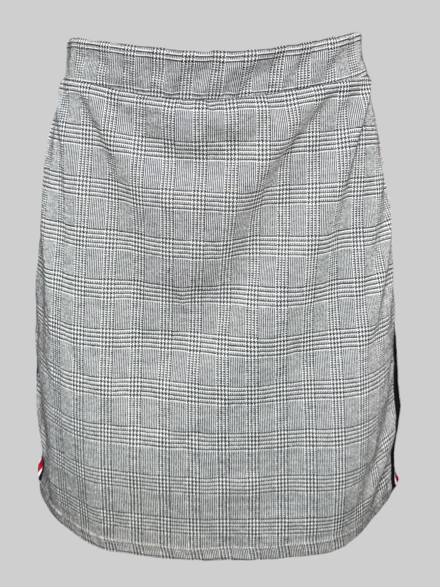 XL black and white checkered, houndstooth print skirt with black white and red stripes on the side