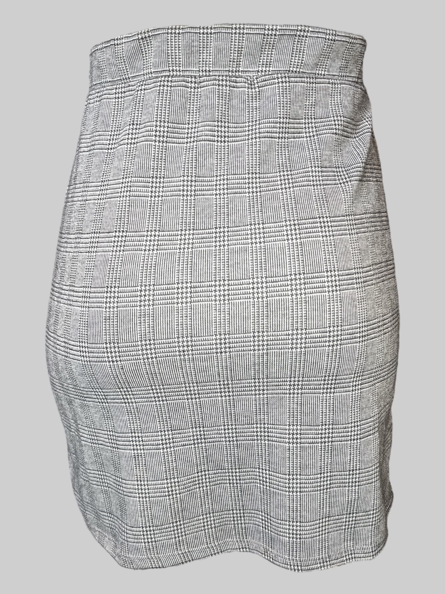 XL black and white checkered, houndstooth print skirt with black white and red stripes on the side