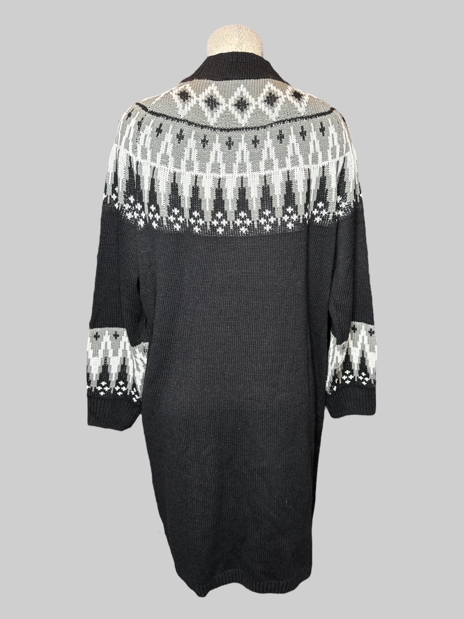 0X Black grey and white knit, long sleeve dress with geometric designs on neckline and cuffs