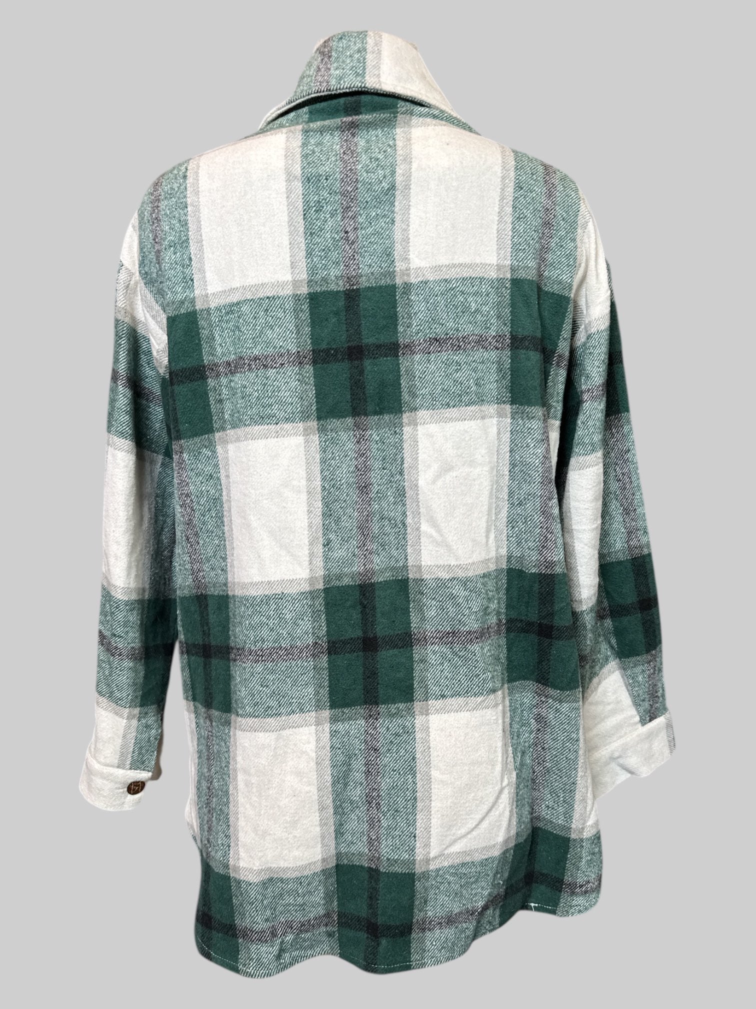 1X green, white and black plaid flannel with two front pockets and wooden buttons