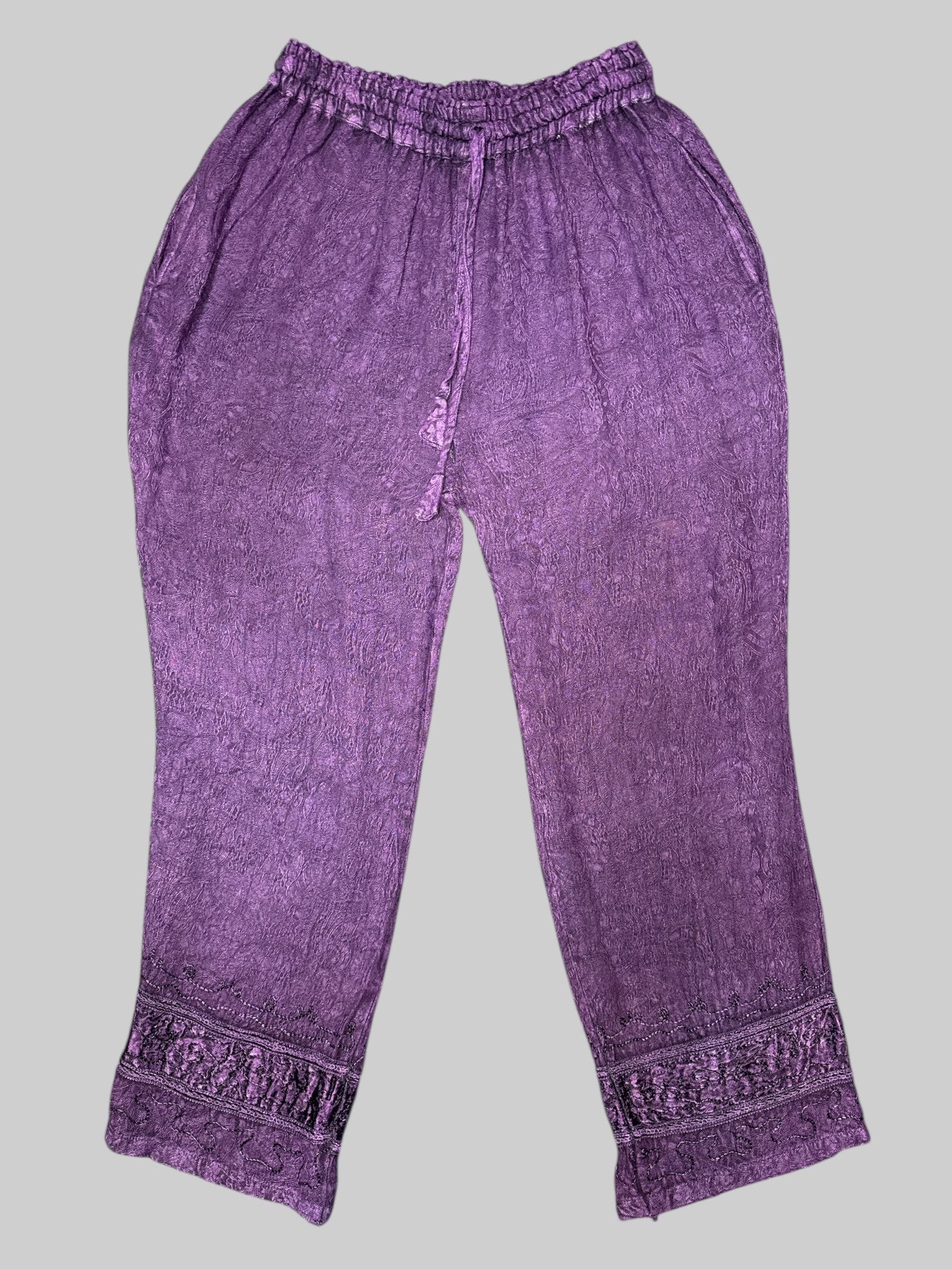 XL purple, soft, stretchy pants with drawstrings, pockets, and or Nate embroidery on legs