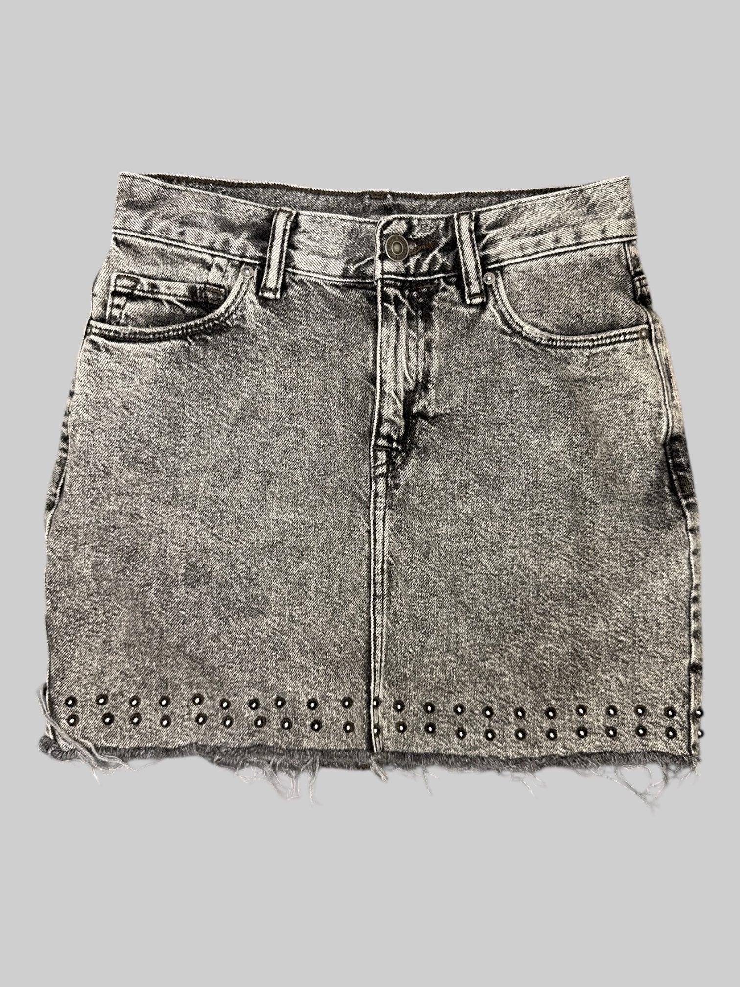 S black washed denim skirt with fringing on bottom, and small metal studs on front and back