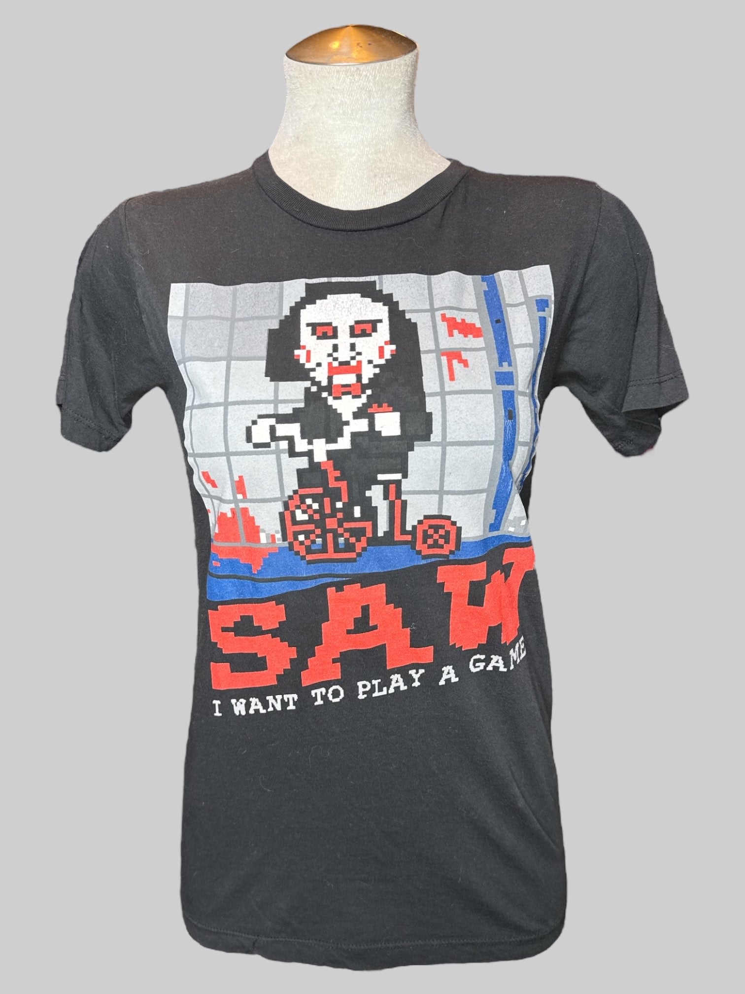 S black tee with “SAW I wanna play a game“ graphic