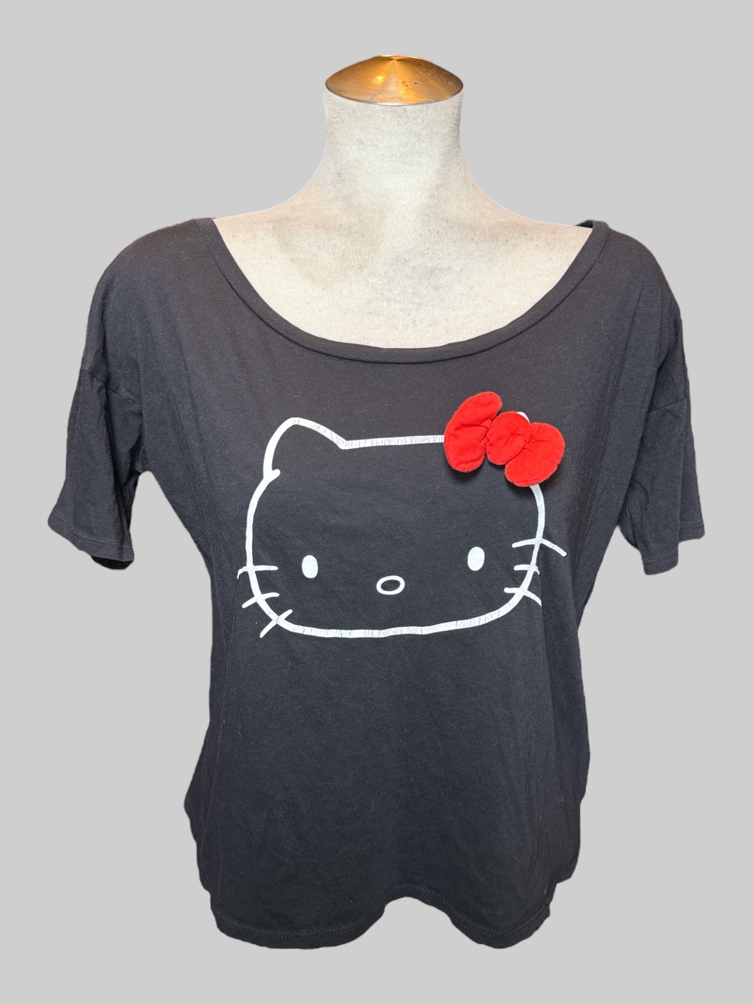 S black tee with Hello Kitty graphic on front