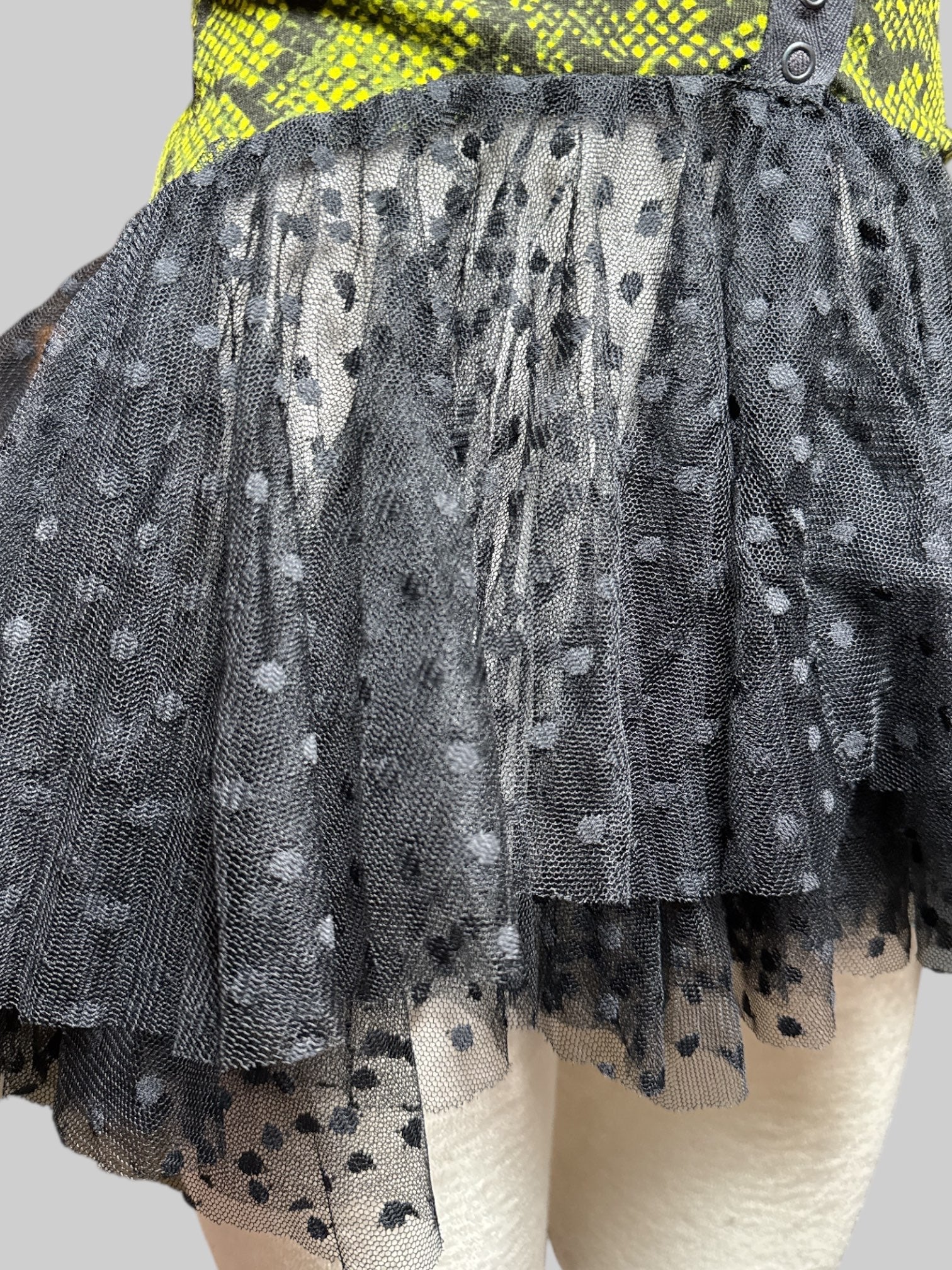 S green and black snap button top with black sheer tulle bottom