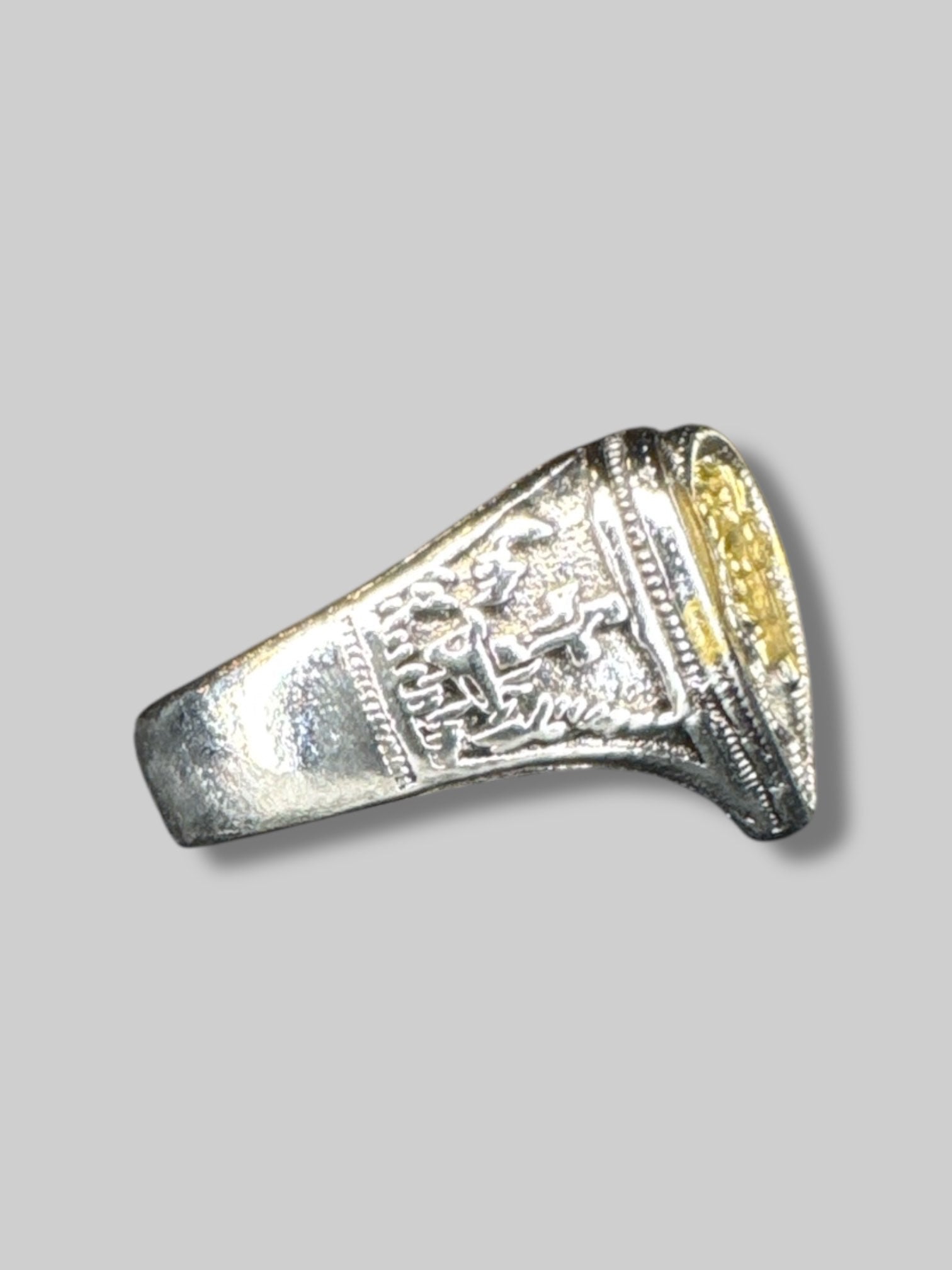 Adjustable silver tone ring with broken heart and gold color faces