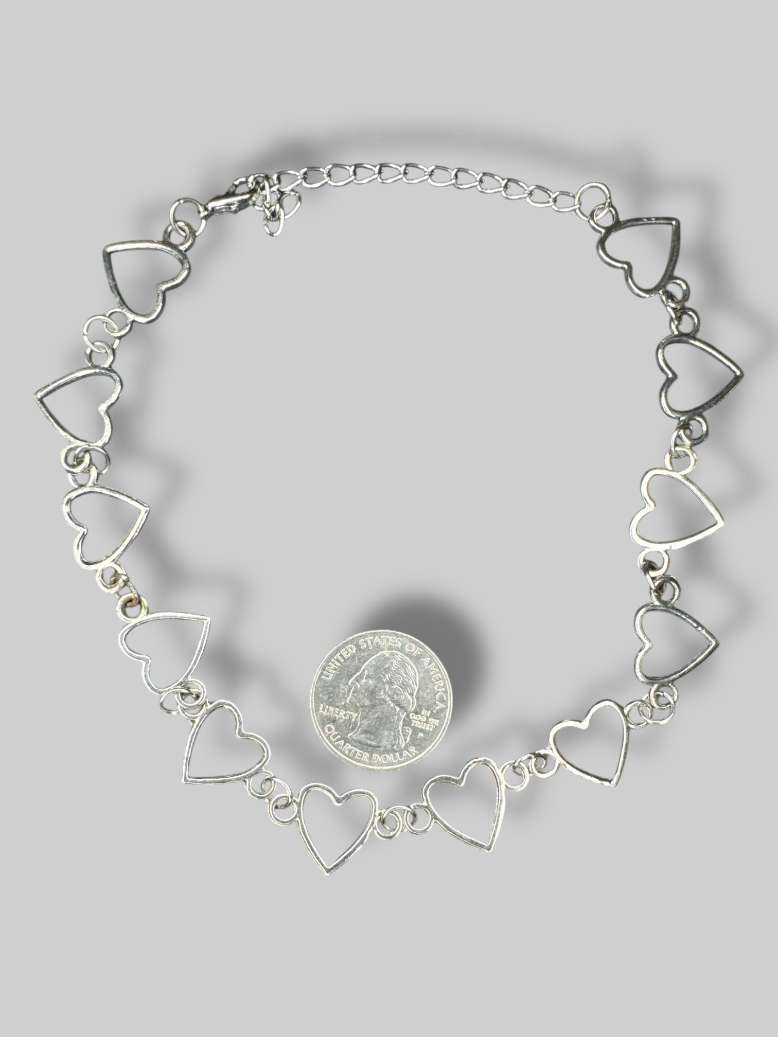 Silver tone heart choker
