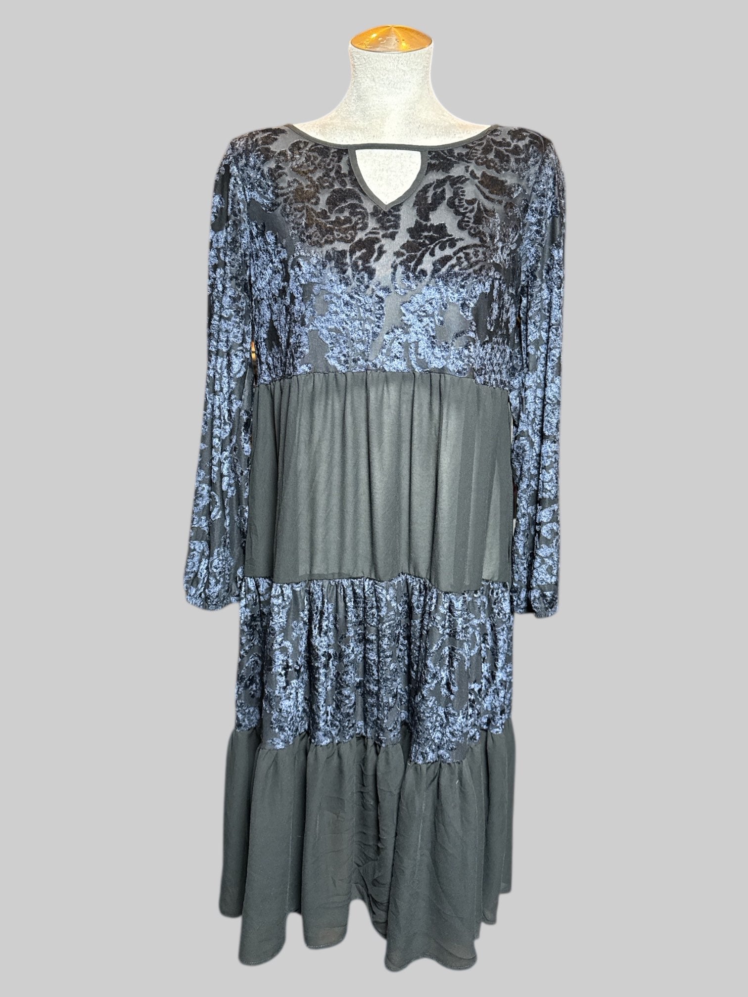 L black, long sleeve dress with balloon sleeves, velvet burnout tiered, design, and keyhole and button on back