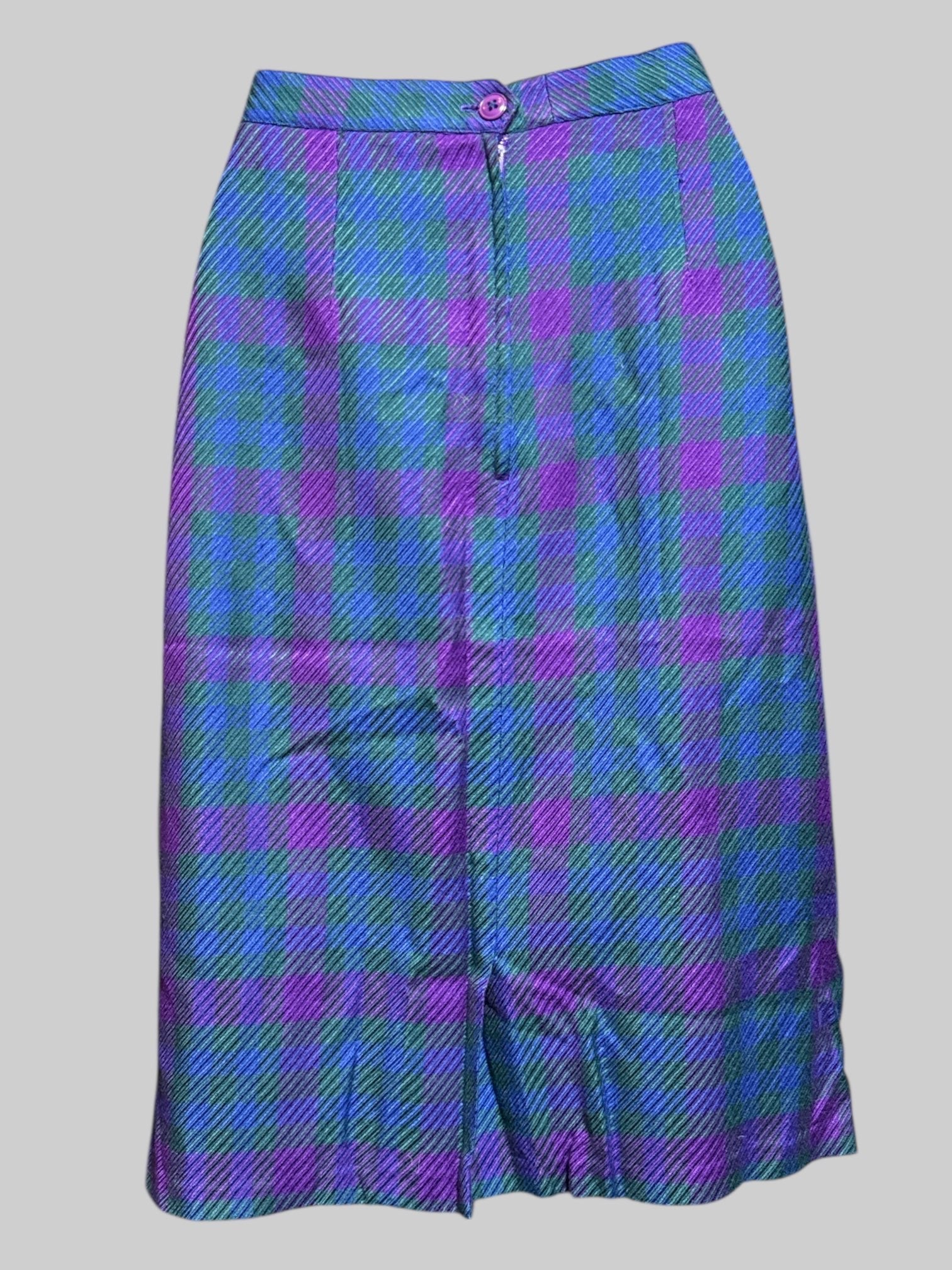 S vintage blue, black and purple plaid skirt with pockets, button and zipper on back, and pleading on front