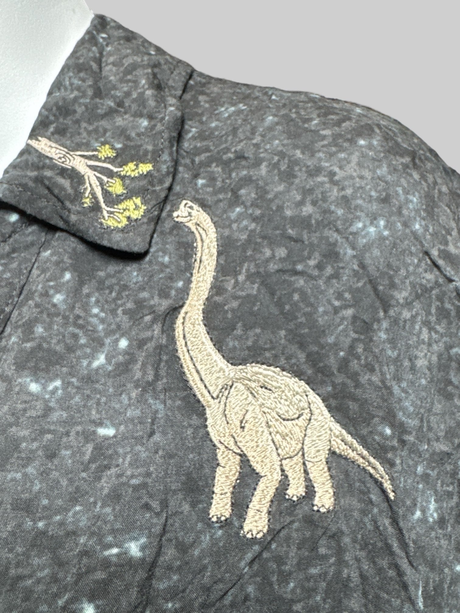 1X black pixelated “Jurassic Park”short sleeve button down with dinosaur and tree embroidery on front