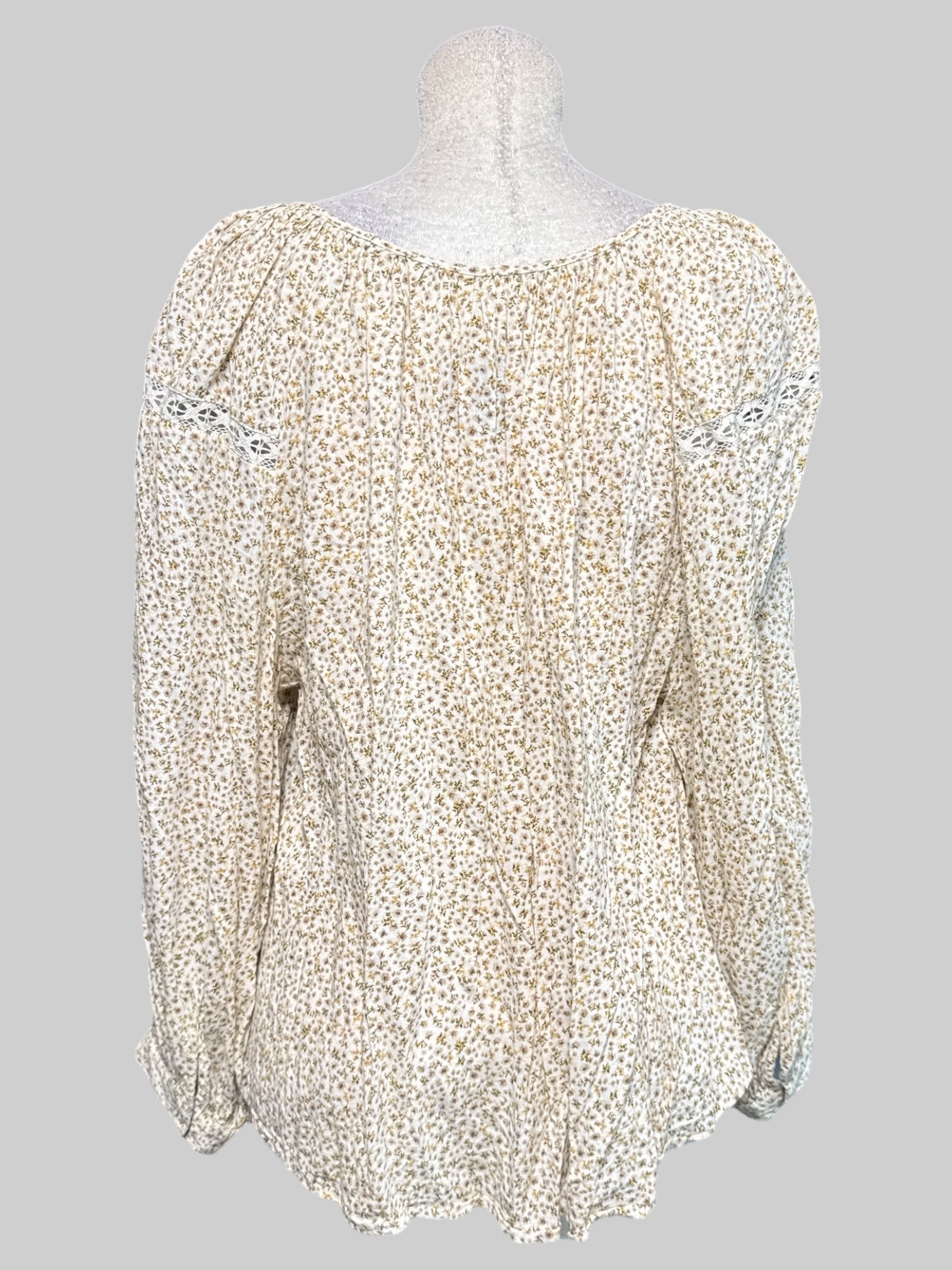 2X cream long sleeve blouse with green and brown florals, lace cut outs, and buttons
