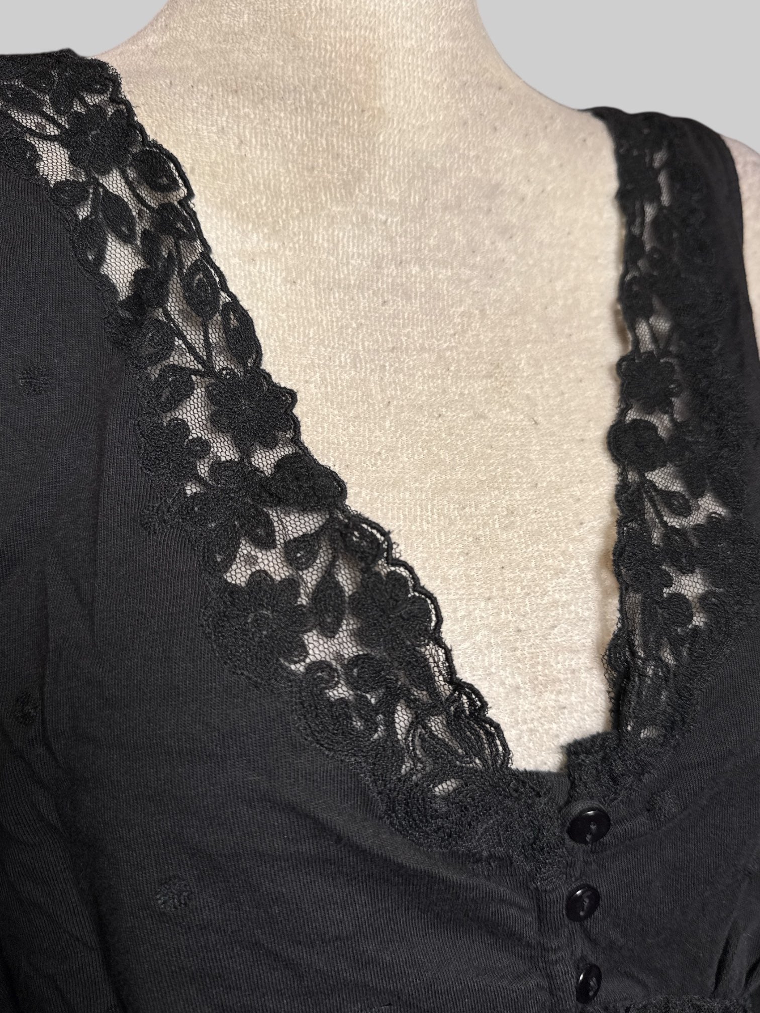 4X black sleeveless top with lace and sheer polka dot panels