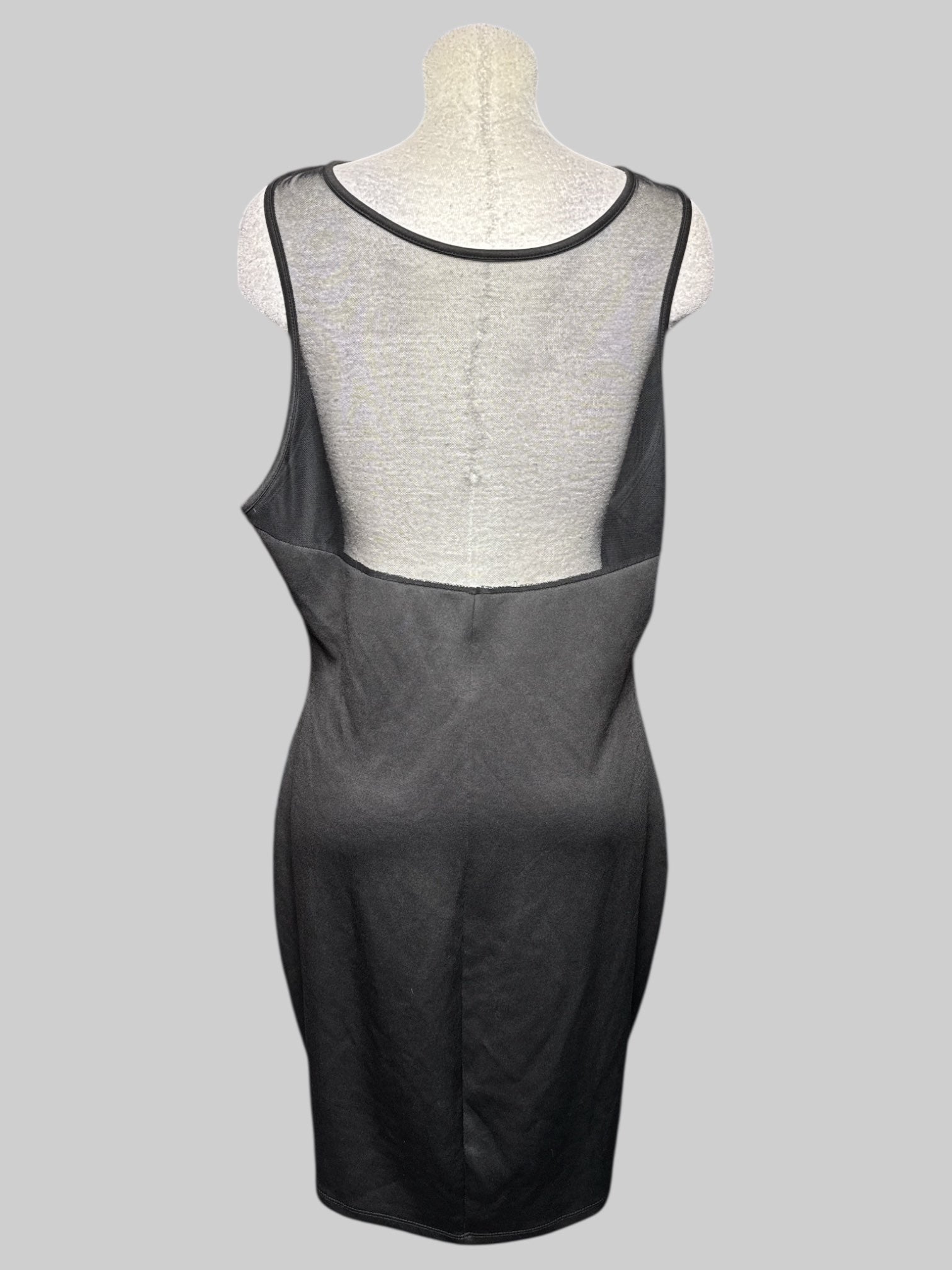 3X black sleeveless body con dress with metallic gold accents and sheer chest and back
