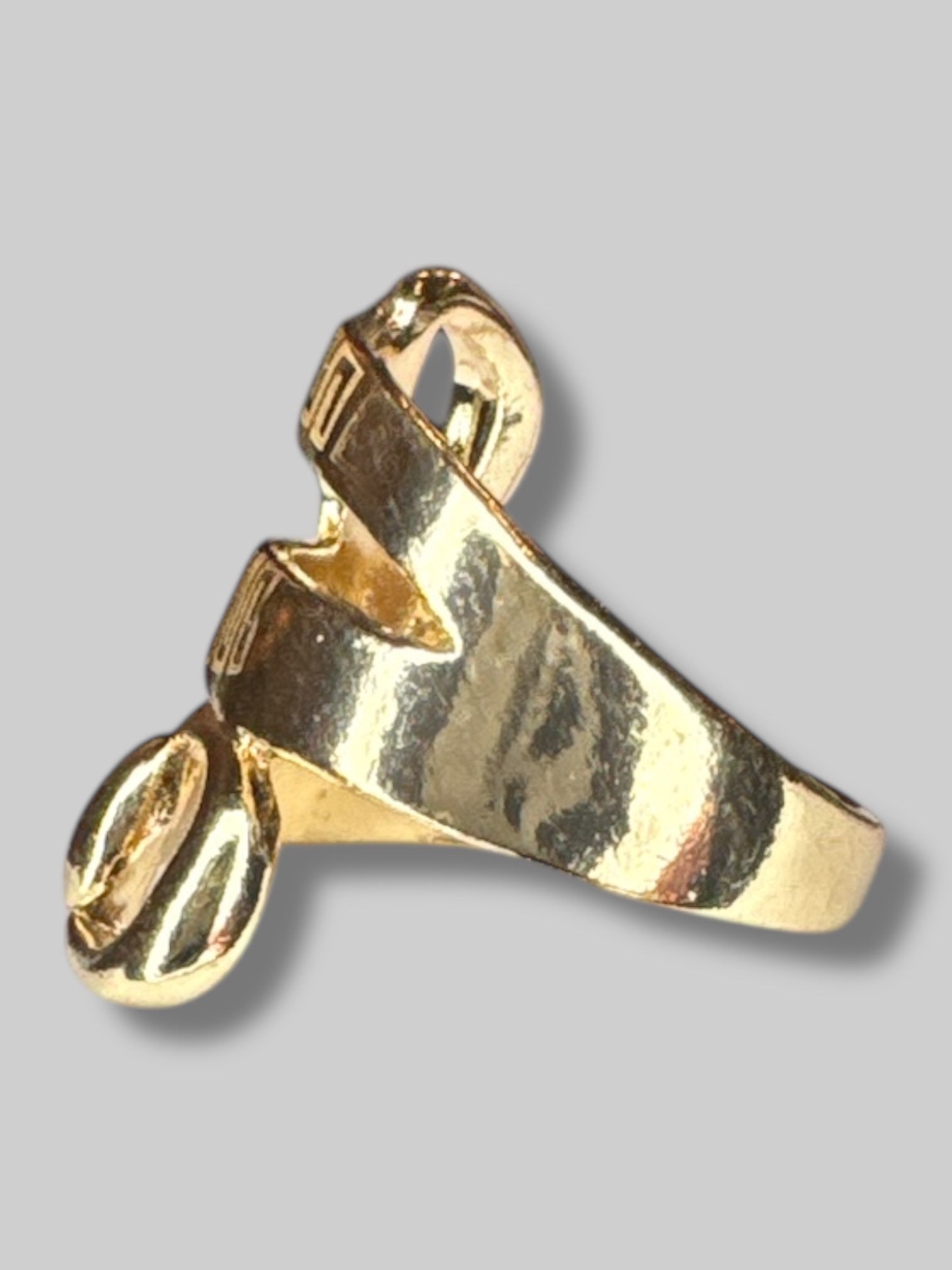 Size 8.5 gold tone belt ring