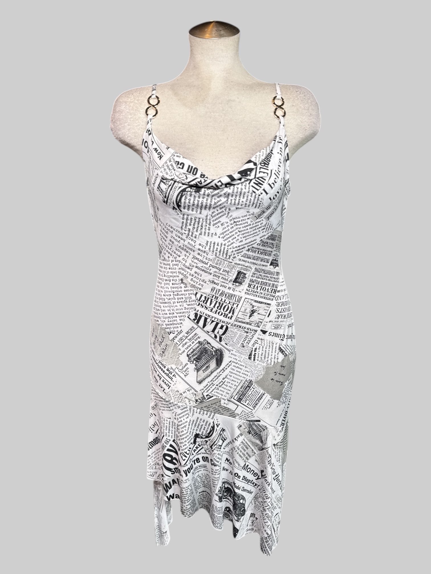 1X NWT white sleeveless dress with newspaper print, asymmetrical, hem, droopy, neckline, and metal figure eights on straps