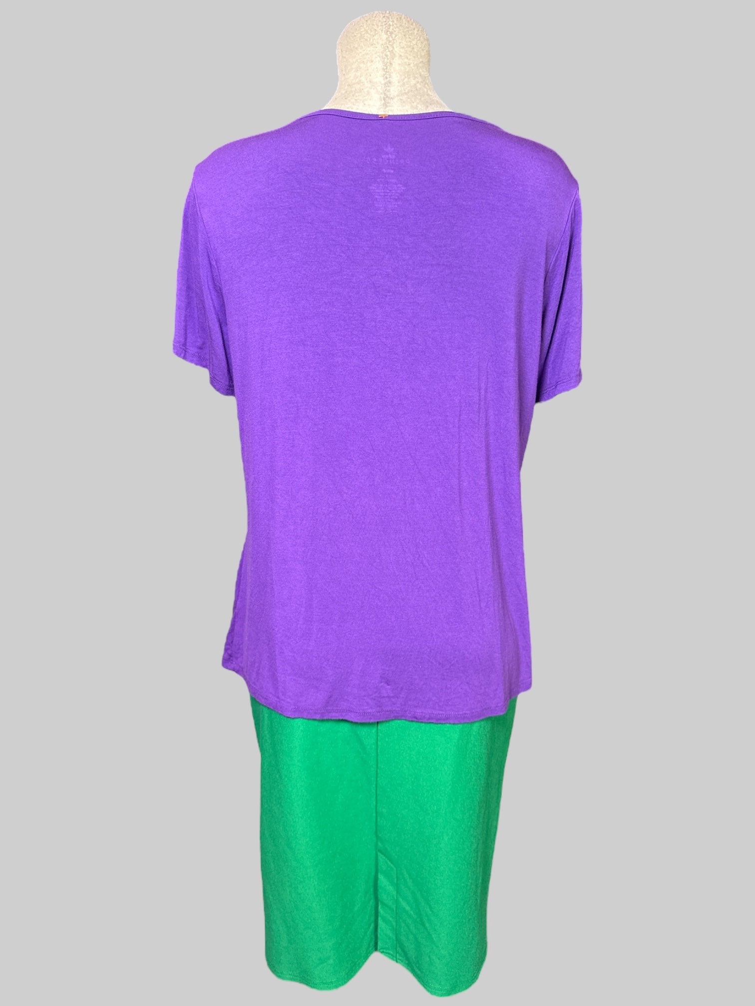 2X two piece, set Disney’s The Little Mermaid themed skirt and top with little mermaid emblems on bottom of skirt and sleeve of top, and tie on top