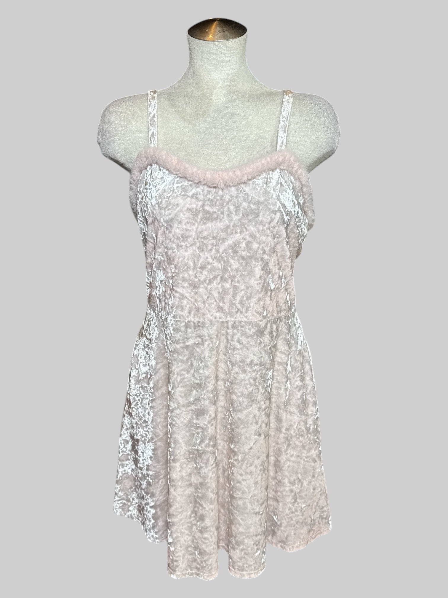M light pink crushed velvet sleeveless dress with fuzzy hem line, zipper on back, and pockets