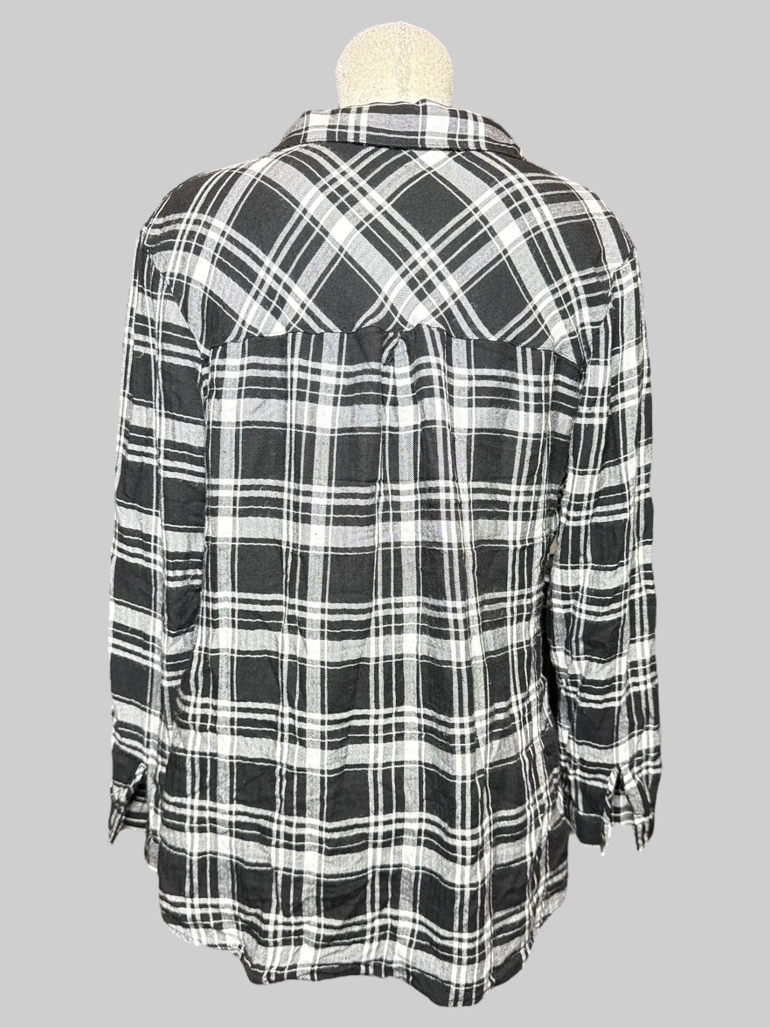L black and white plaid top with criss cross chest