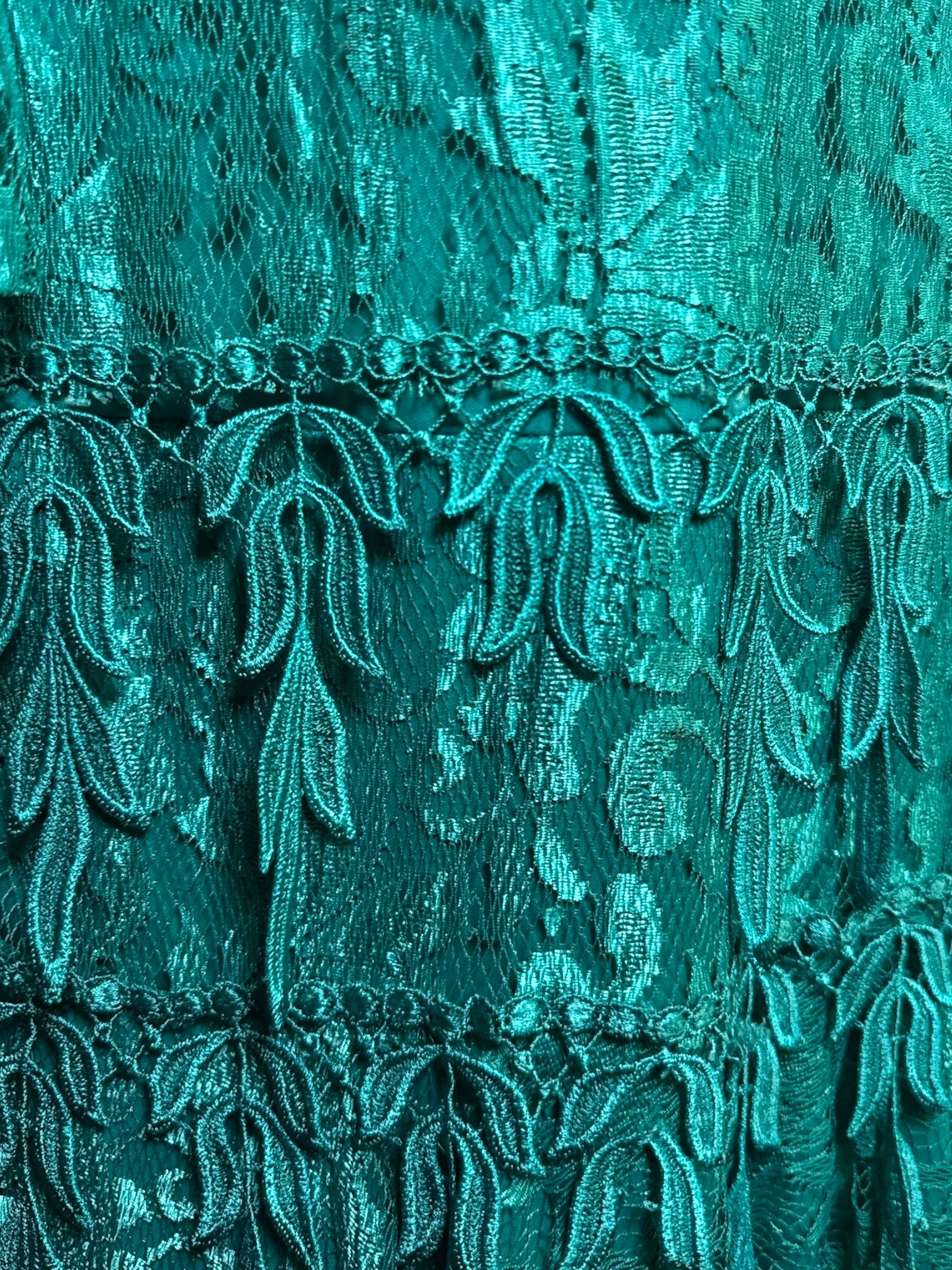 1X vintage teal tiered dress with sheer lace sleeves, shoulder pads, and beautiful florals and was made in the USA