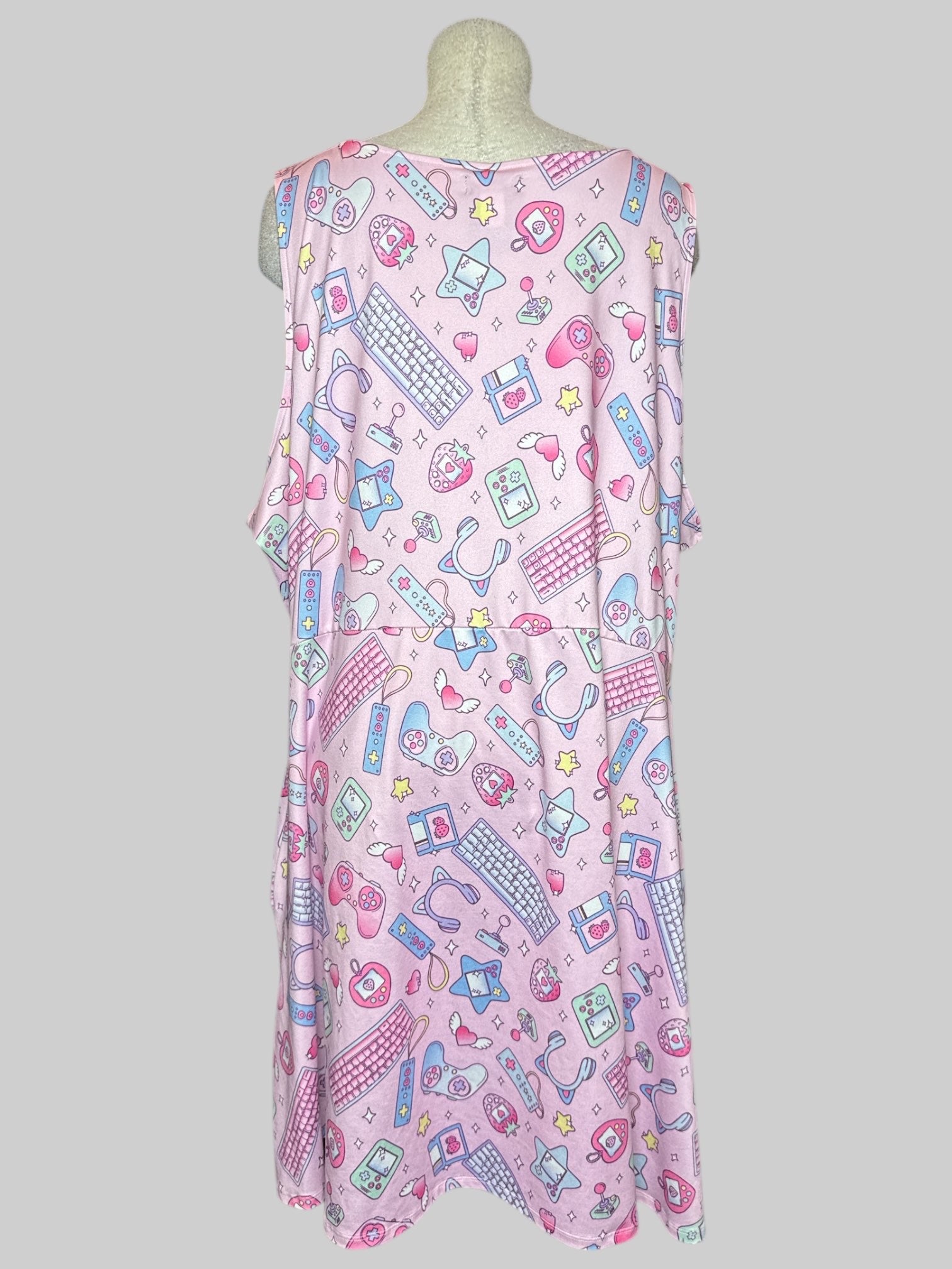 5X pink sleeveless dress with cute gaming pattern