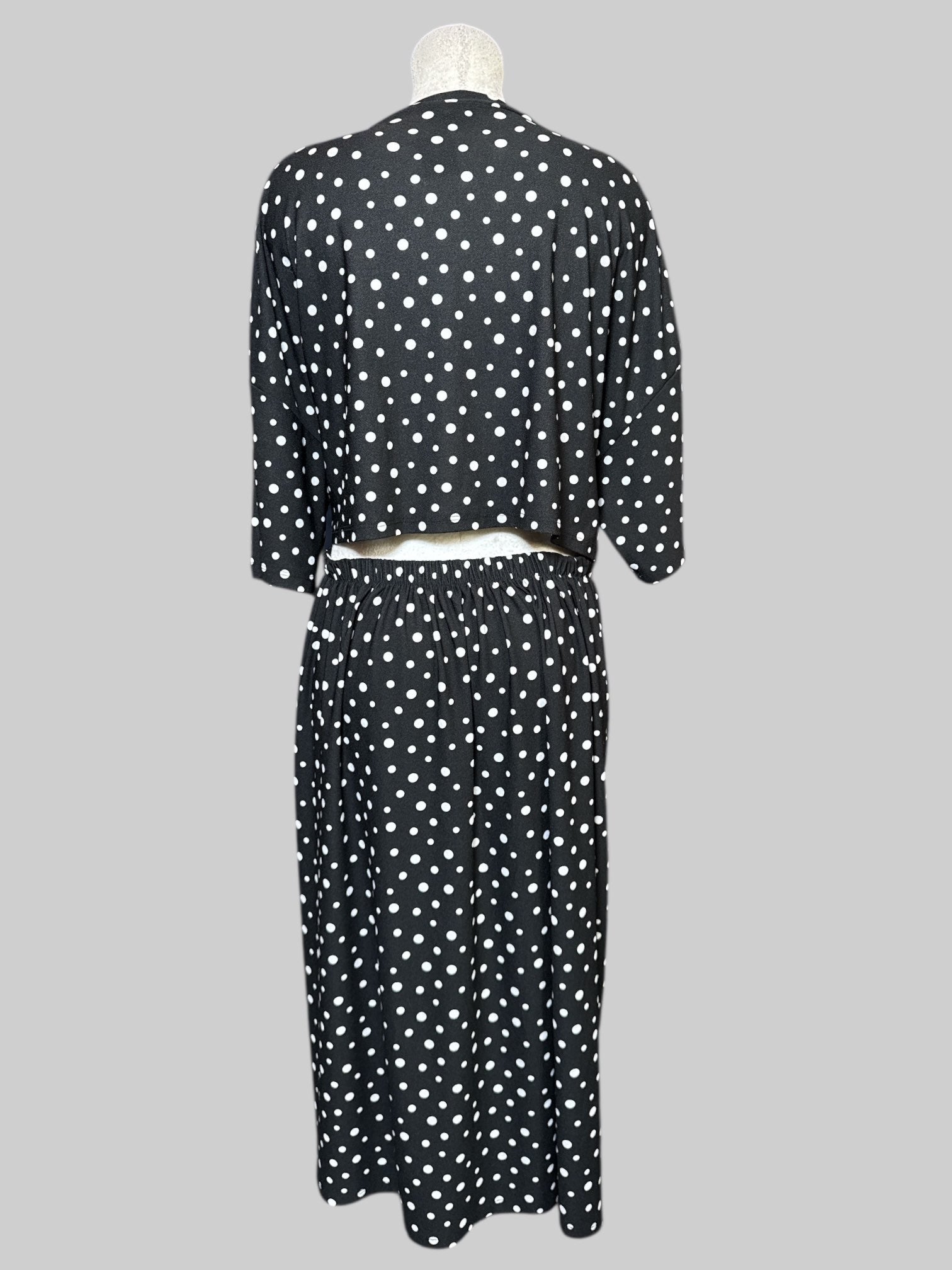 3X black and white polkadot short, free dress with elastic waistband, and mid drift cut on back