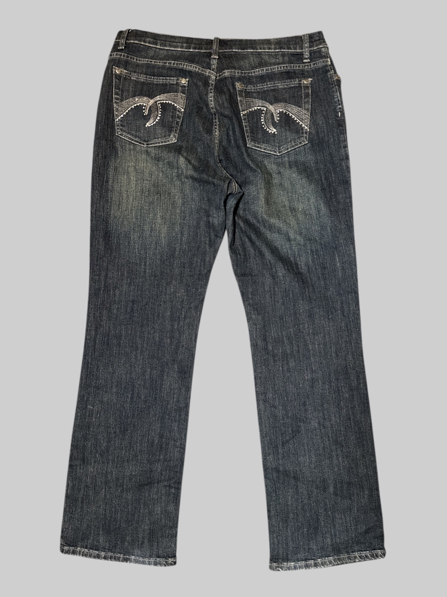 L vintage denim jeans with silver stitching, bedazzling, pockets, and belt loops