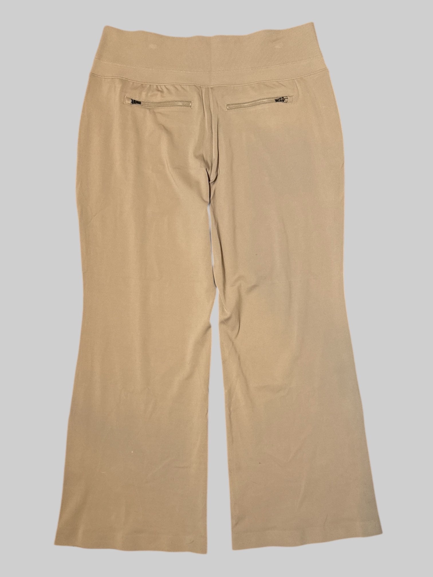 1X NWT beige workout pants with multiple pockets, including three zipper pockets