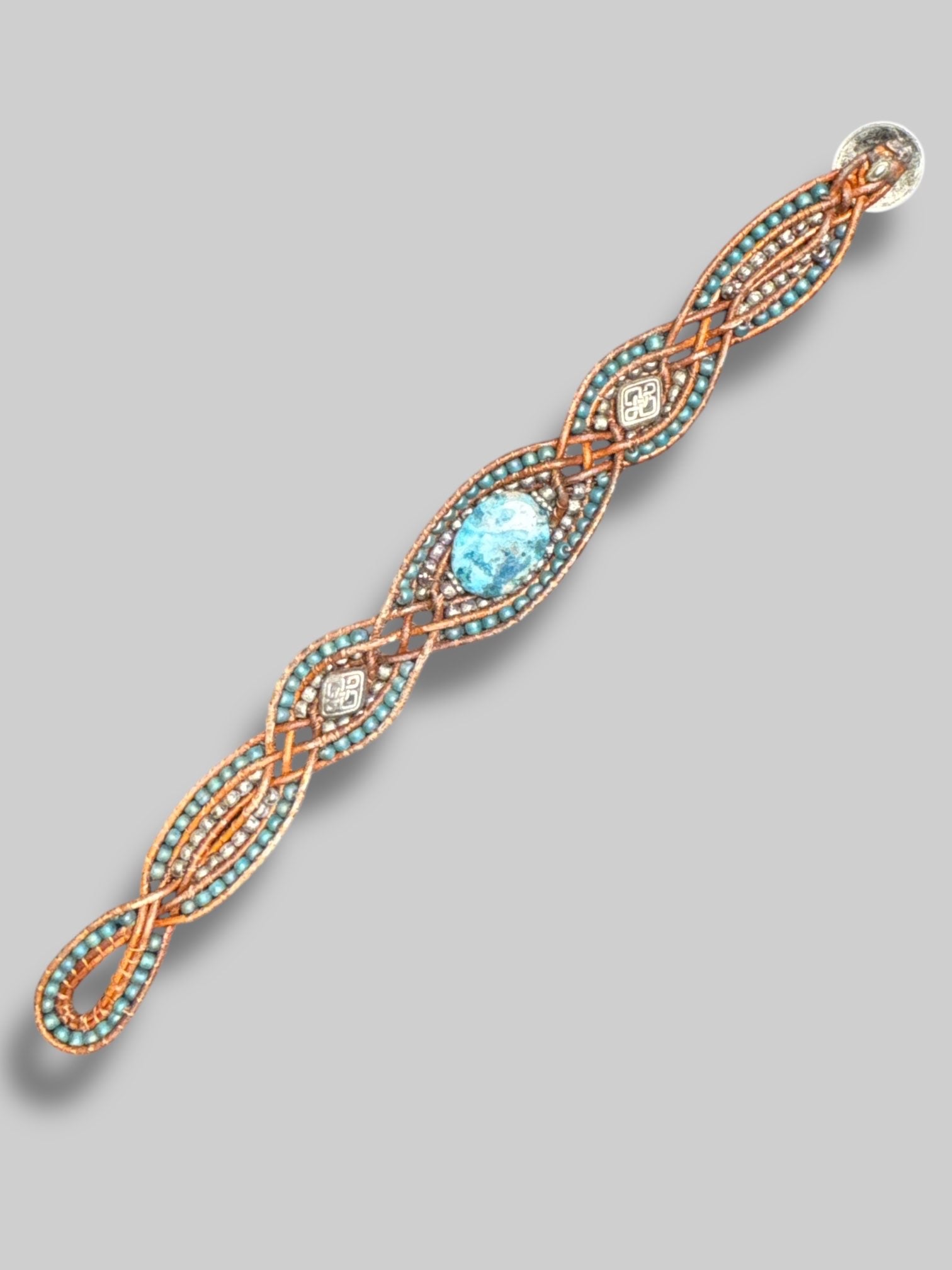8.5” long braided bracelet with beads and stone