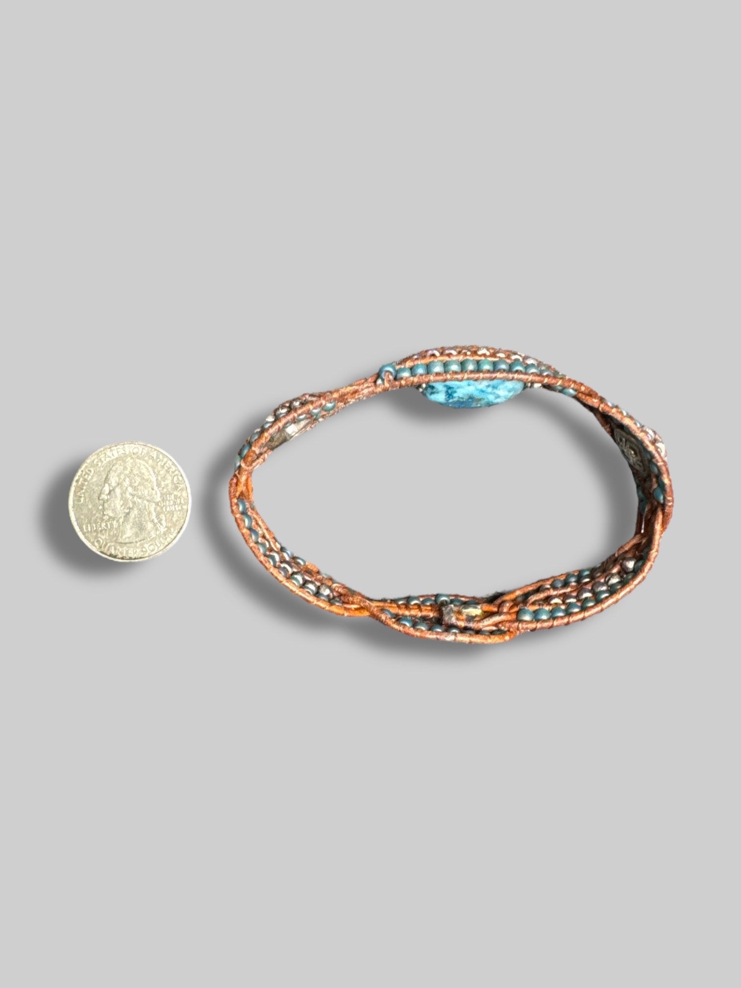 8.5” long braided bracelet with beads and stone