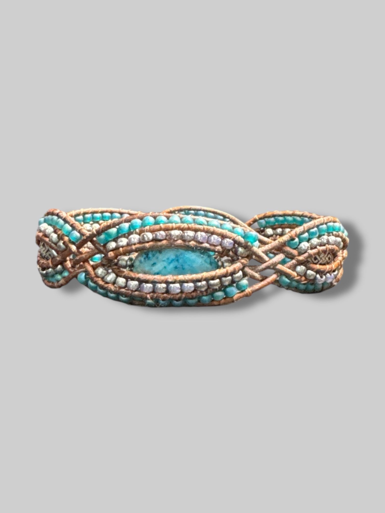 8.5” long braided bracelet with beads and stone