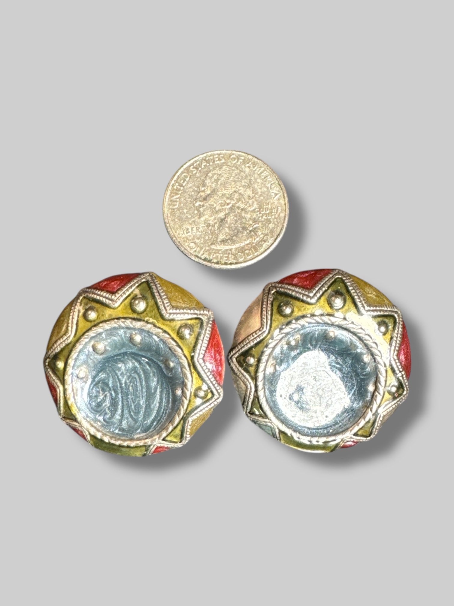 Blue, green, and red clip on earrings