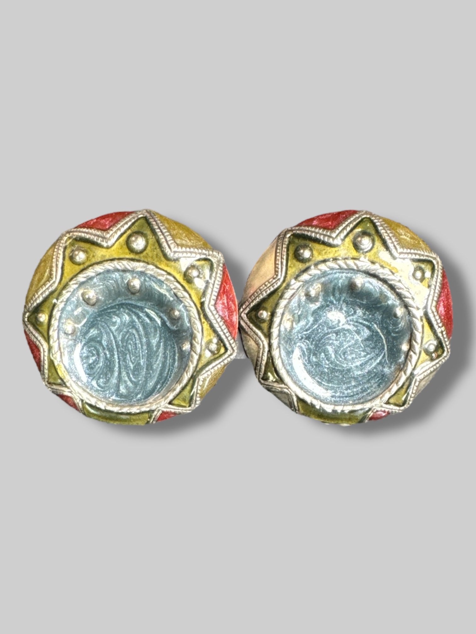 Blue, green, and red clip on earrings