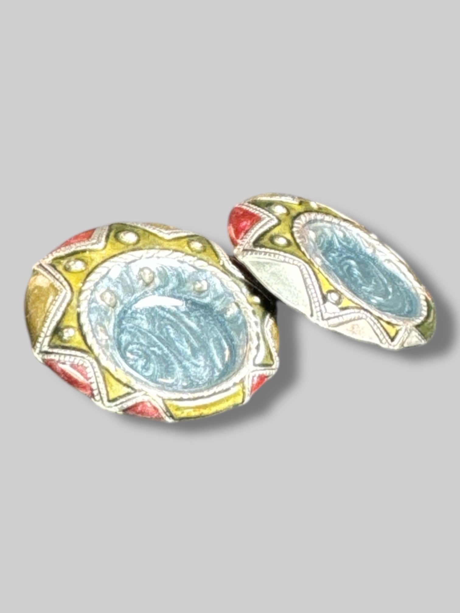 Blue, green, and red clip on earrings