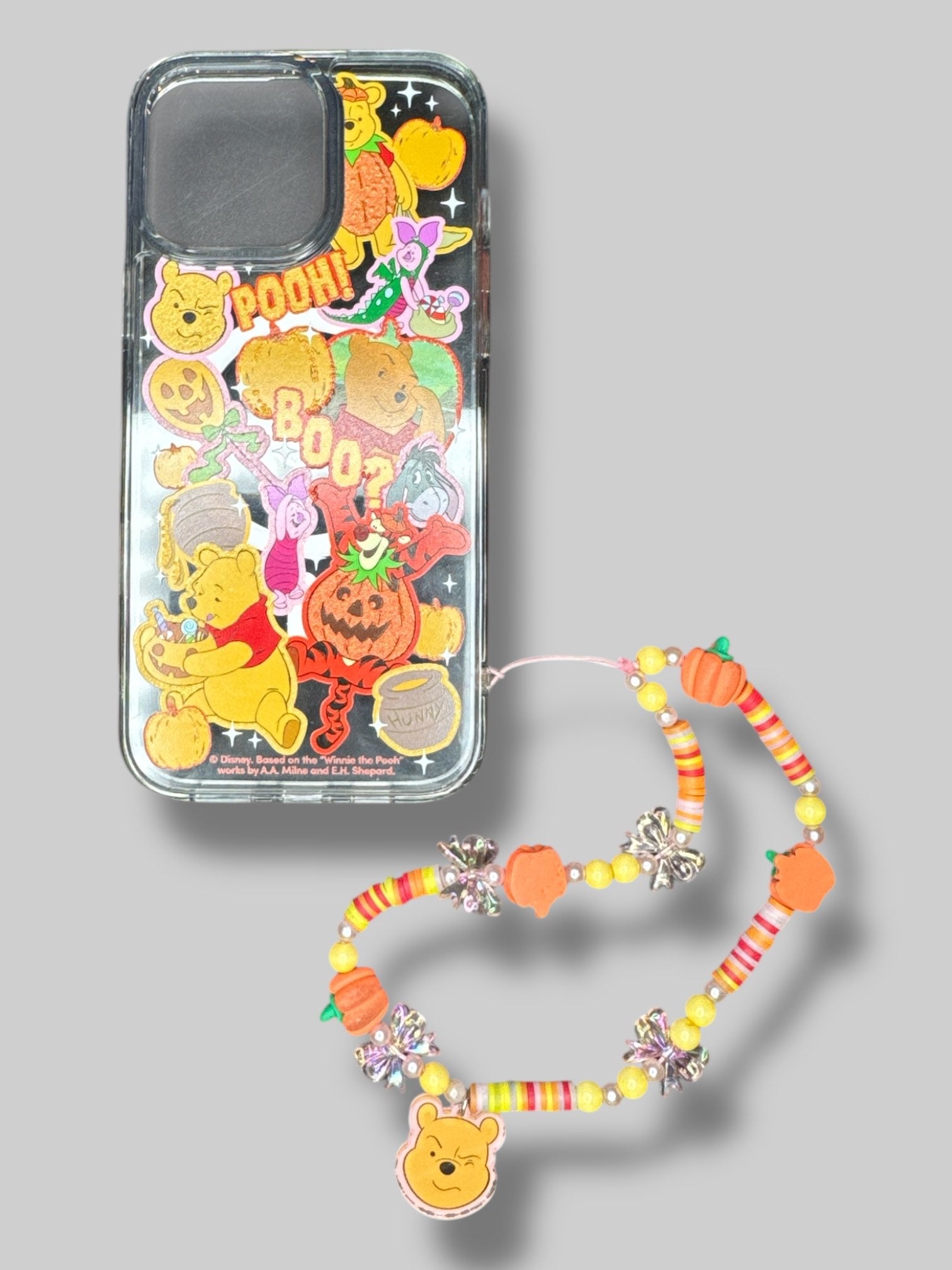 6” by 2.5” Winnie the Pooh phone case with charm