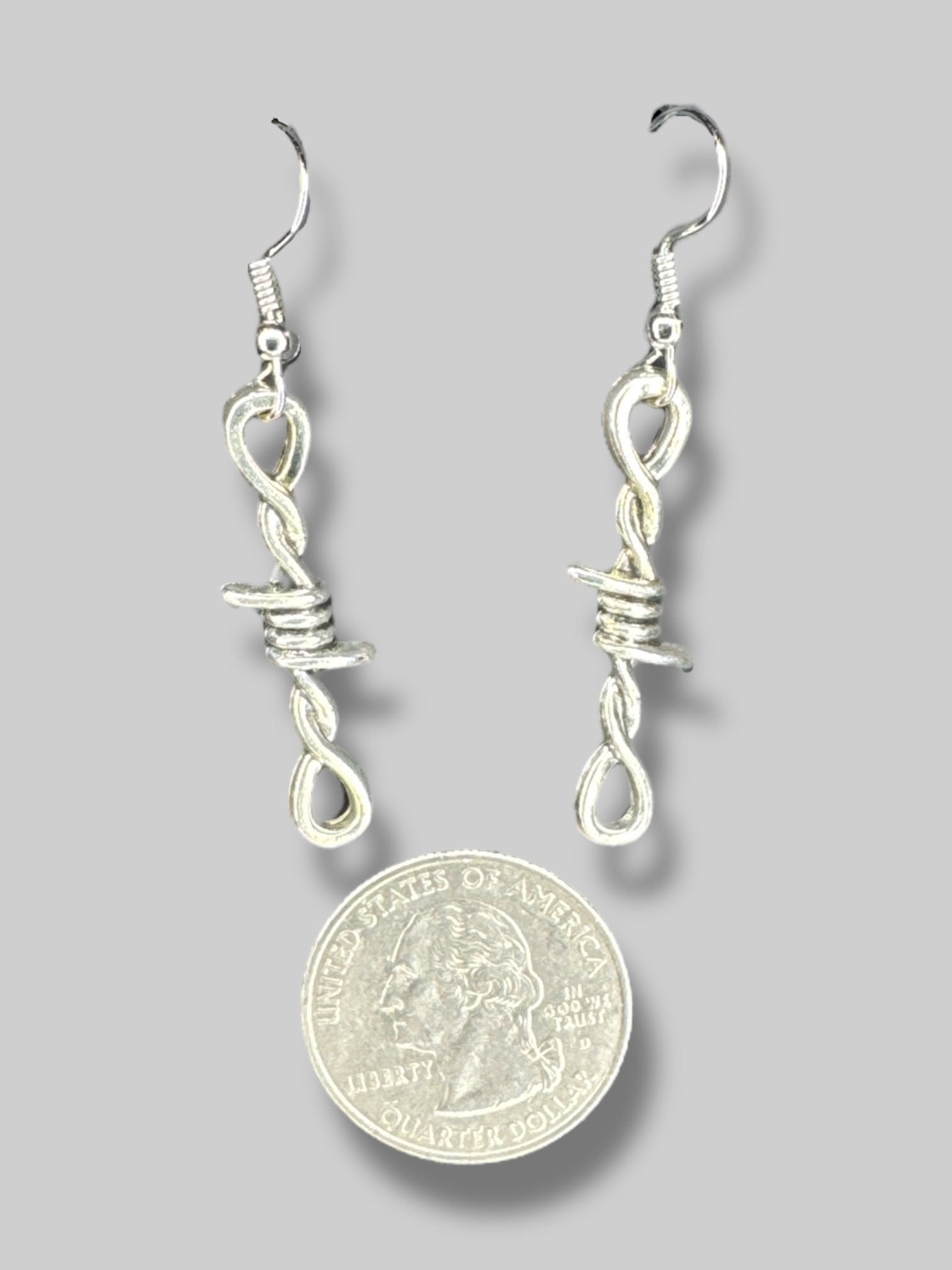 Silver tone barbed wire earrings