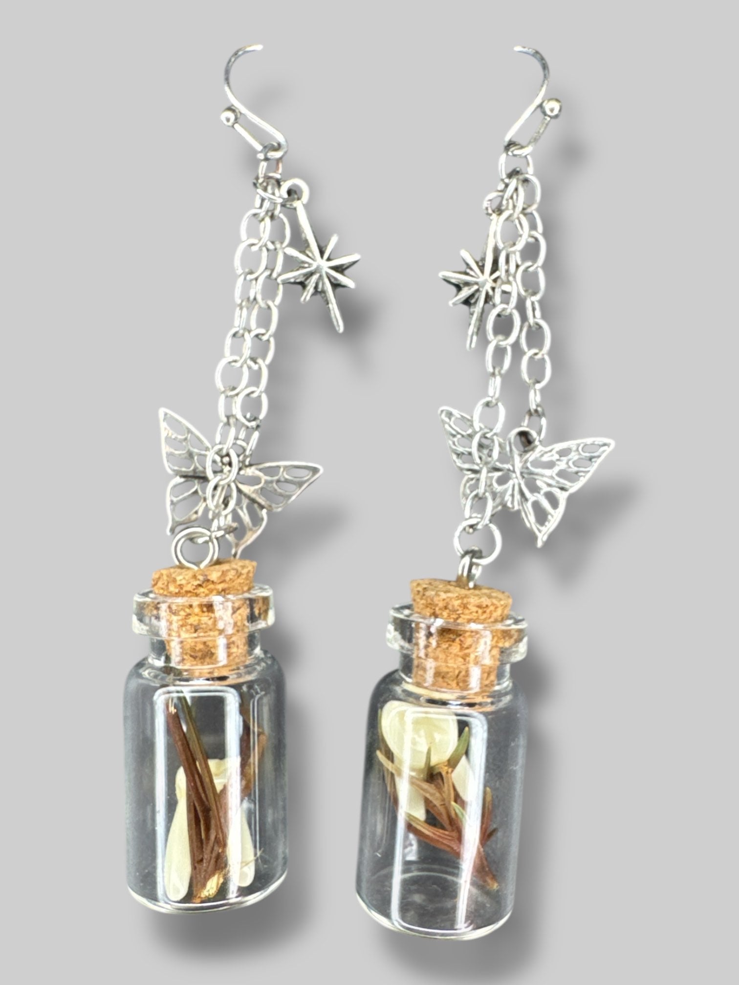 Jar earrings with fake teeth and butterflies on chain
