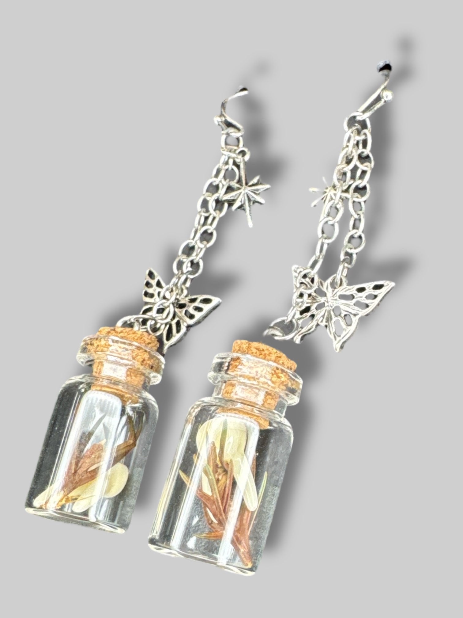 Jar earrings with fake teeth and butterflies on chain