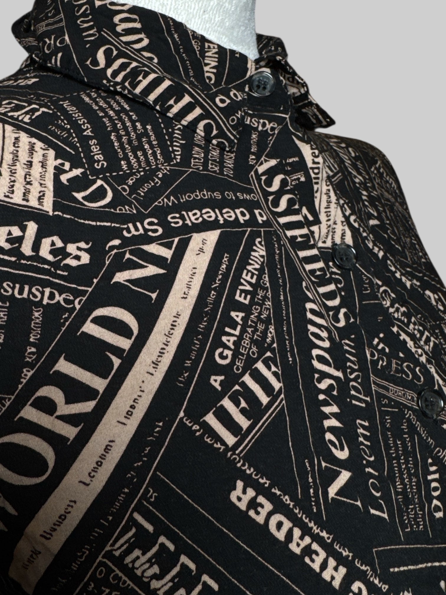 S Milk & Honey cropped twist button up with news print and shirred back