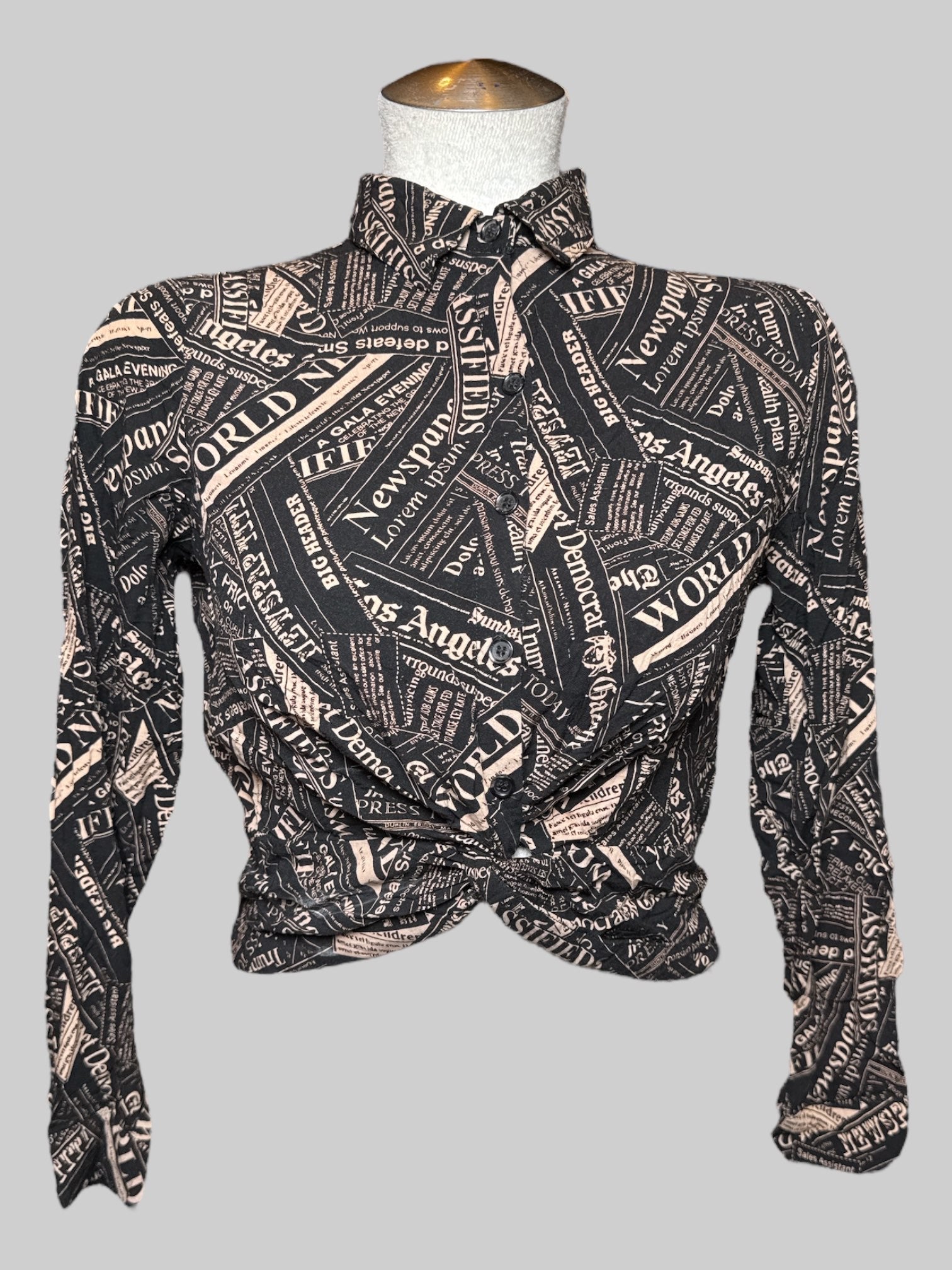 S Milk & Honey cropped twist button up with news print and shirred back