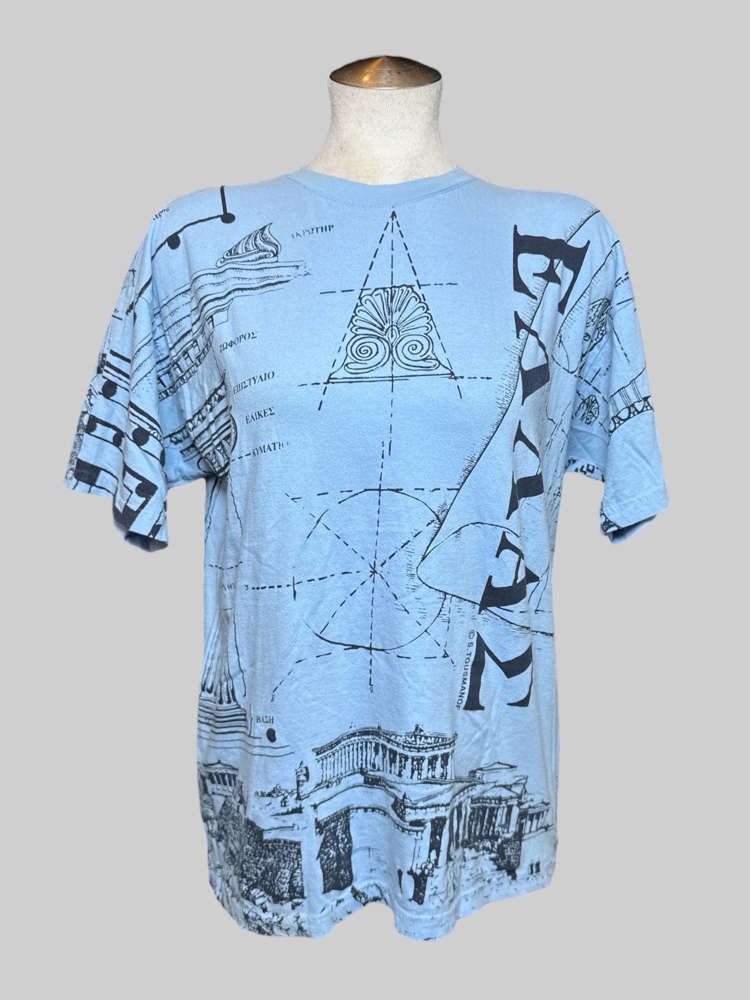 L B&C light blue T-shirt with geometry, and Greek graphics