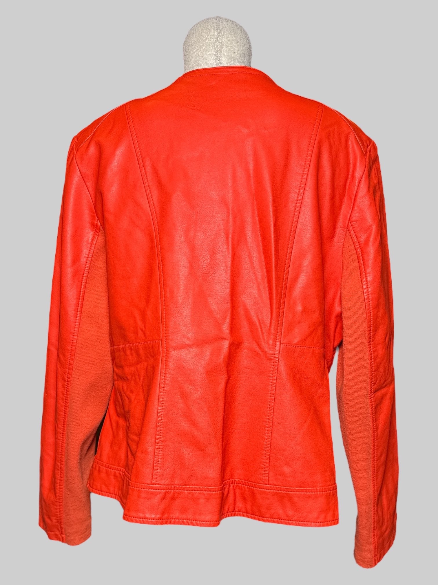 1X Lane Bryant orange, leather jacket with diagonal zip, and pockets