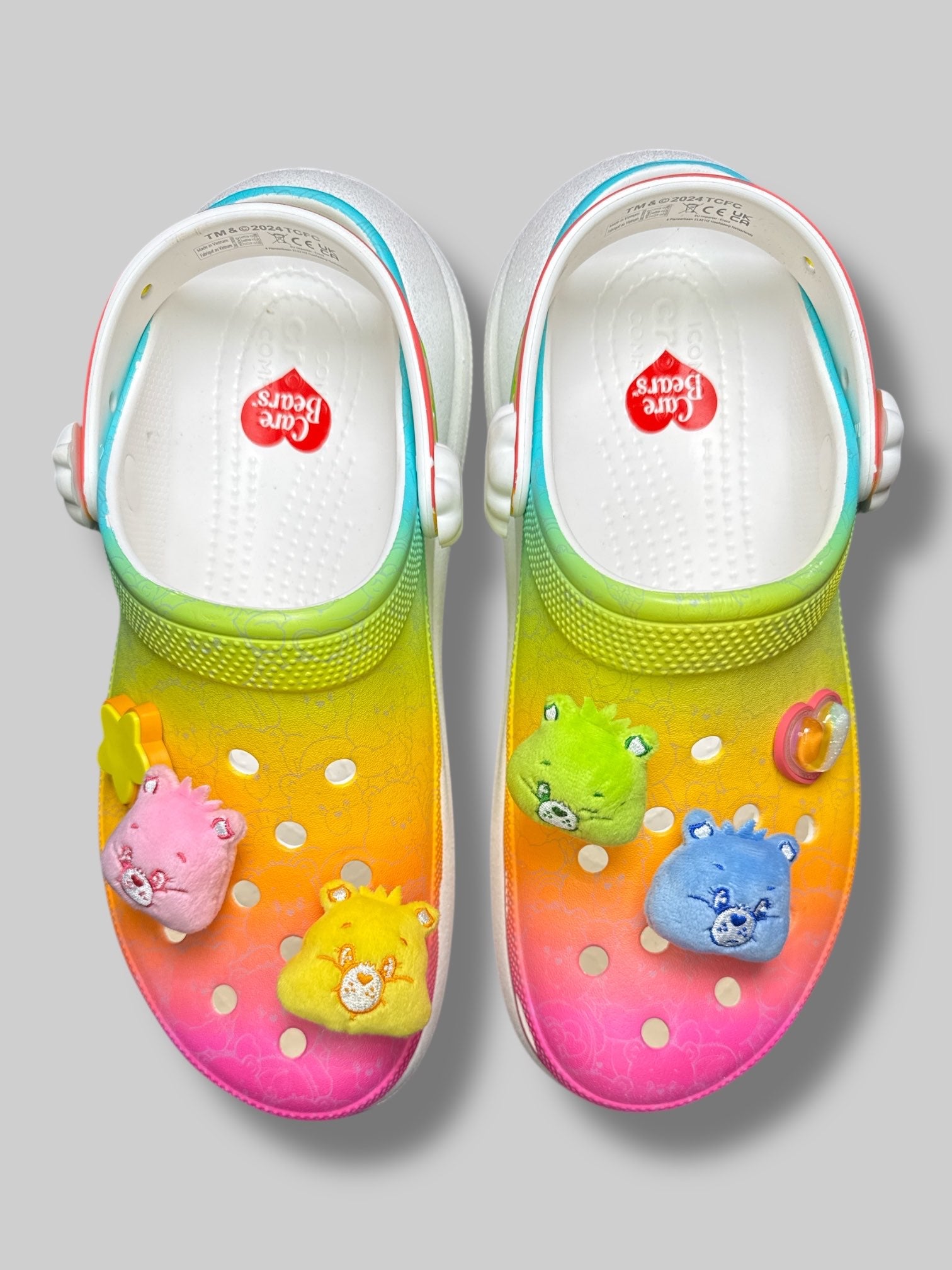 Care Bears x Crocs Men’s 10 or Women’s 12 white and rainbow crocs with sparkly platform and Care Bears jibits