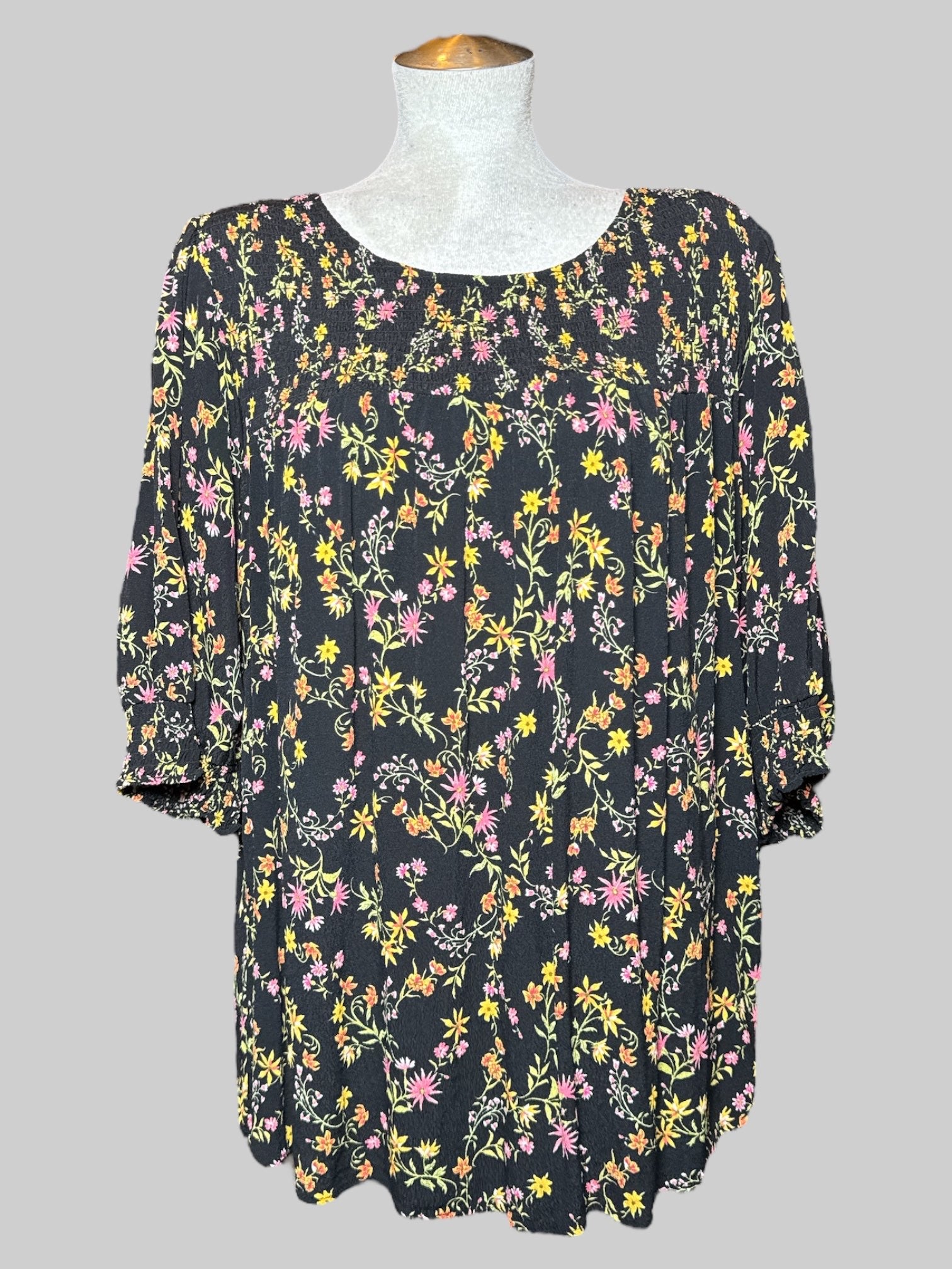 4X Terra & Sky black top with yellow, green, and pink florals and quarter sleeves