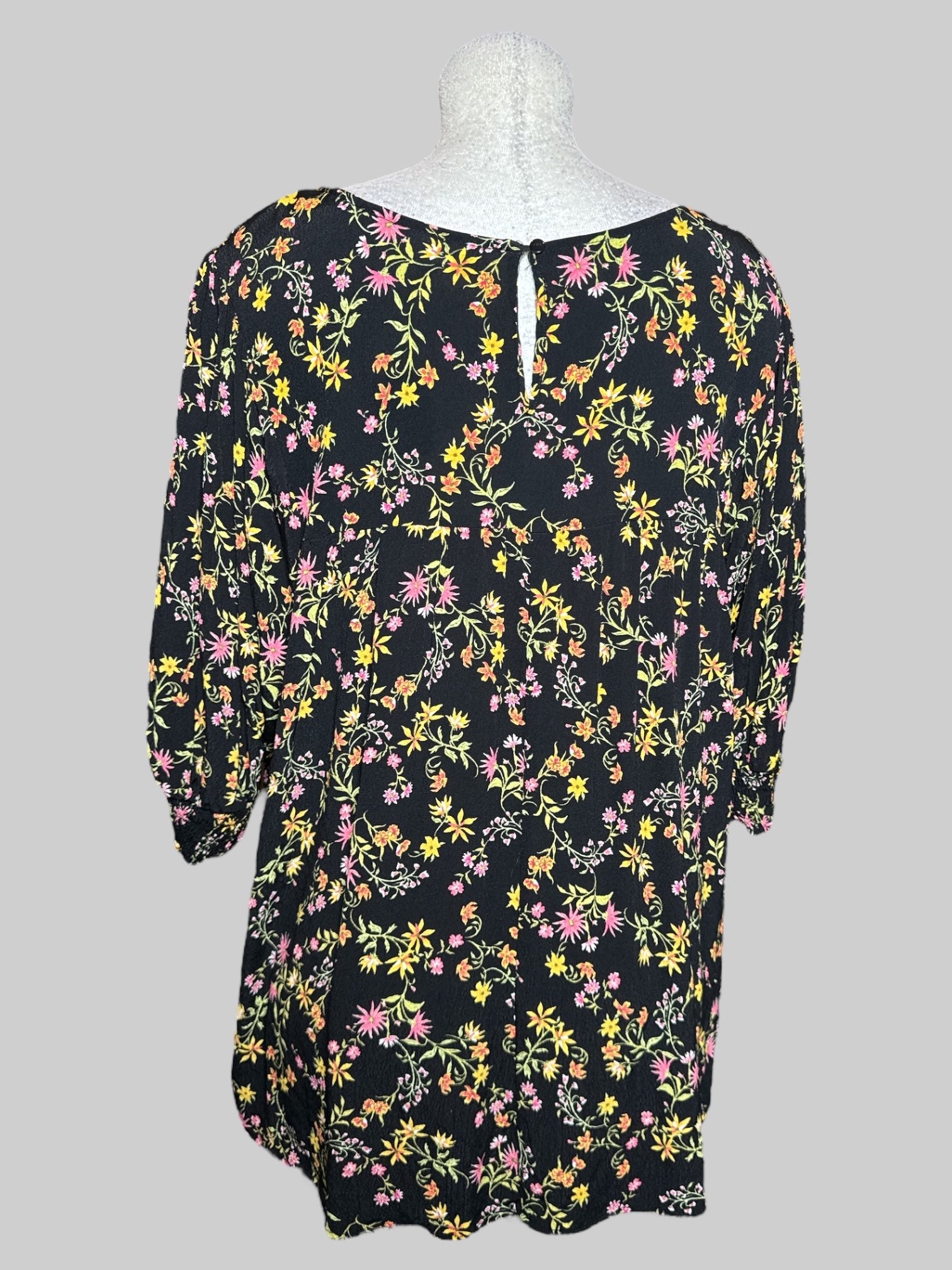 4X Terra & Sky black top with yellow, green, and pink florals and quarter sleeves