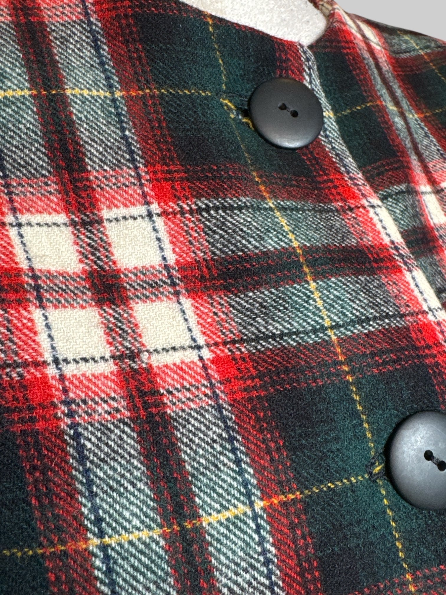 S red, white, yellow, and green plaid button up jacket with shoulder pads