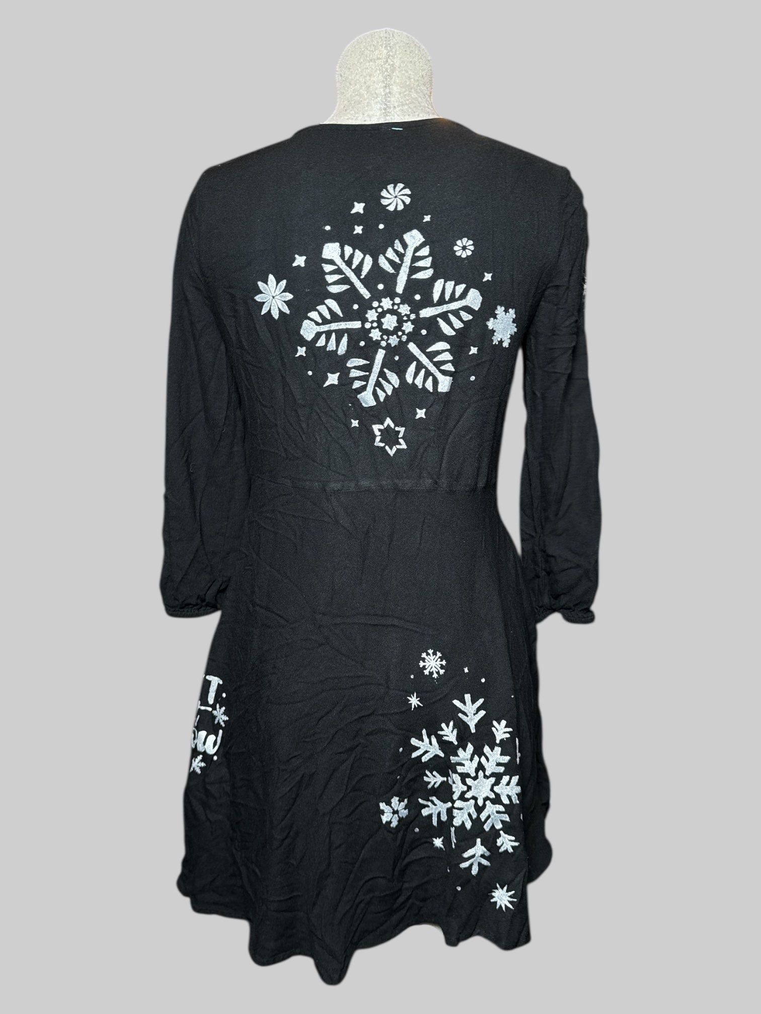 M Mudd black dress with white embroidery, string, and hand painted snow flakes