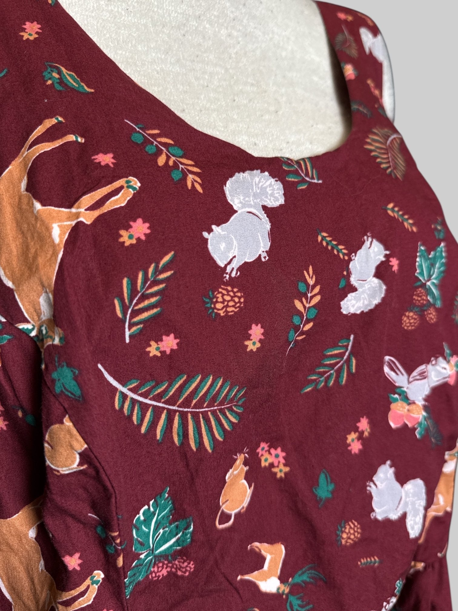 1X ModCloth maroon sleeveless fit and flare dress with deer, squirrels, and botanicals pattern with back zipper