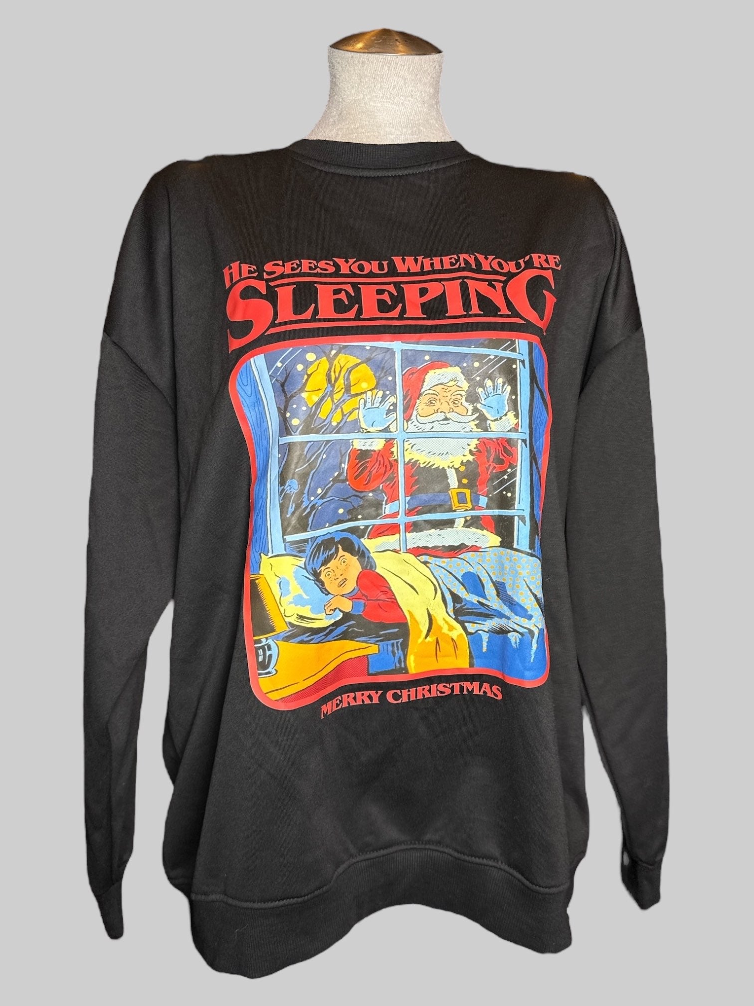 2X black pullover sweater with “He sees you when you’re sleeping” Santa graphic