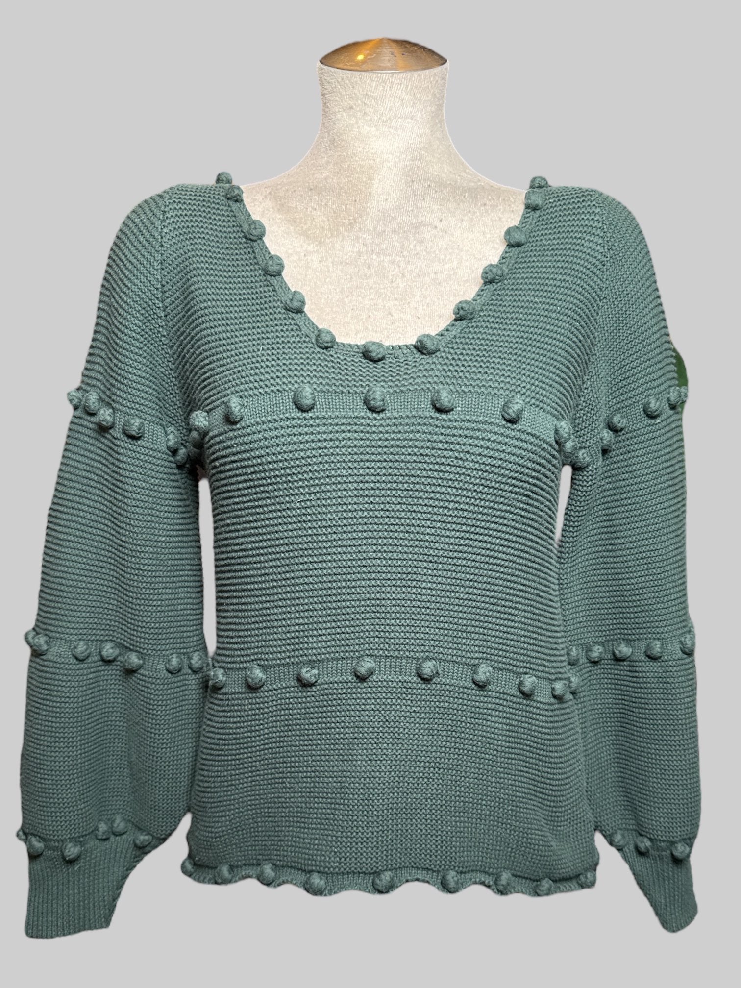 L Storia dark green knit sweater with cuffs and little pom-poms all over